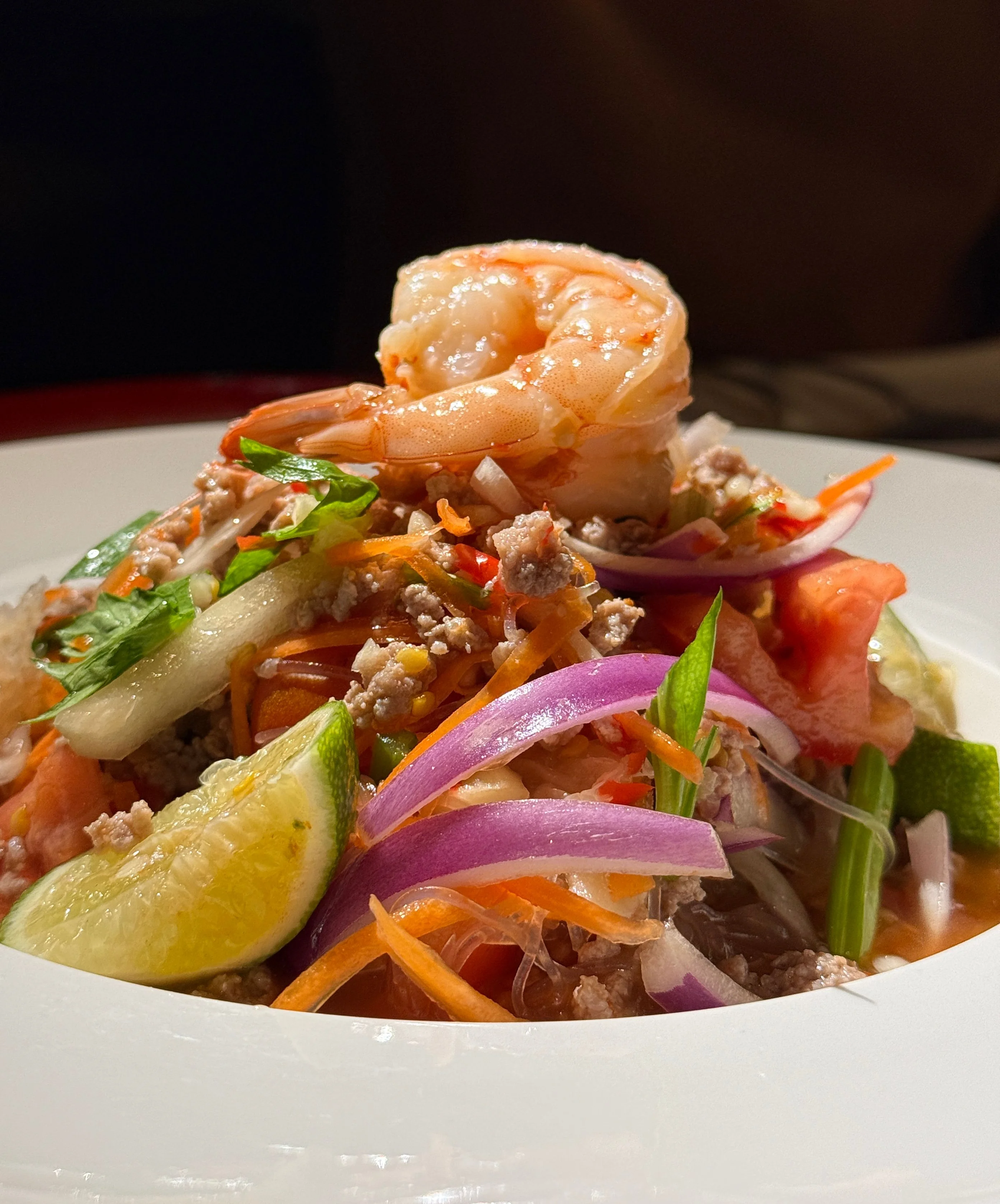 Thai shrimp salad with fresh herbs and vegetables