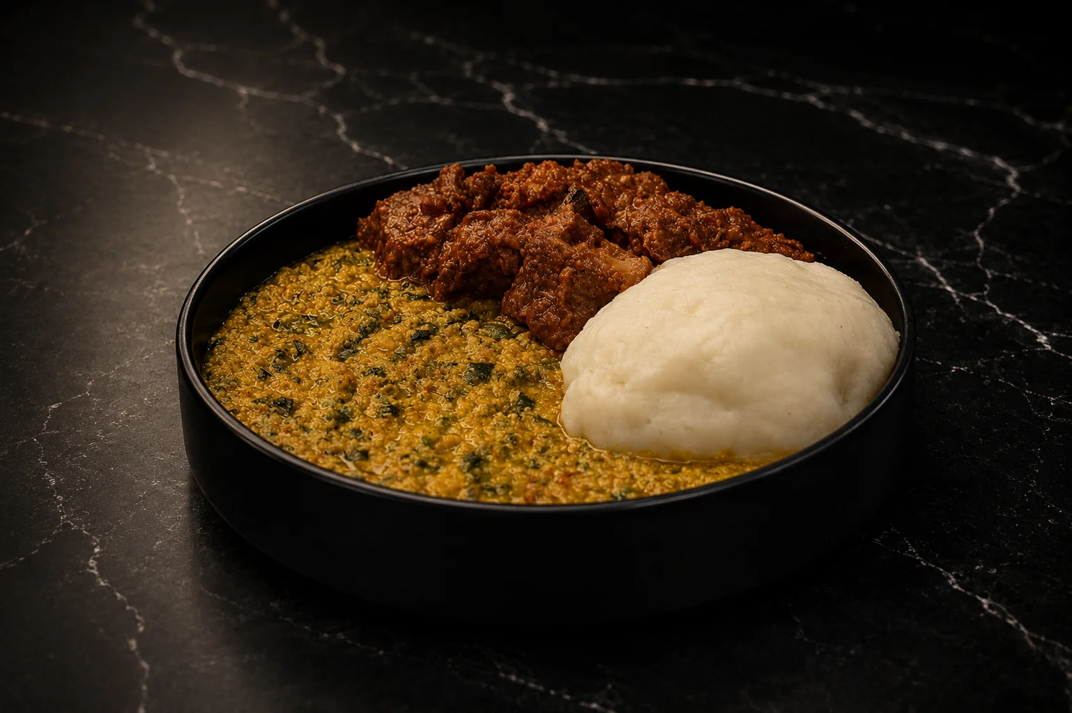 Nigerian efo riro with pounded yam