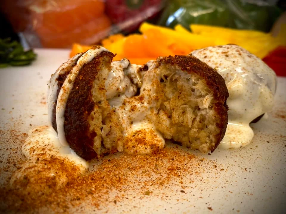 Crispy falafel drizzled with tahini sauce