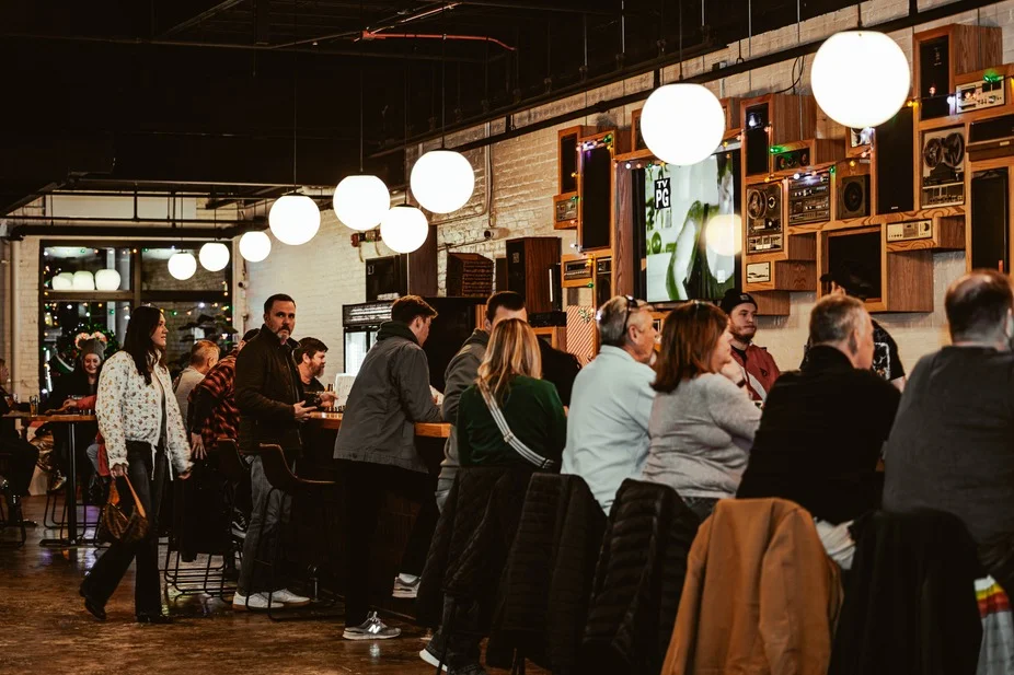 Patrons at Gravely Brewing taproom private event happy hour