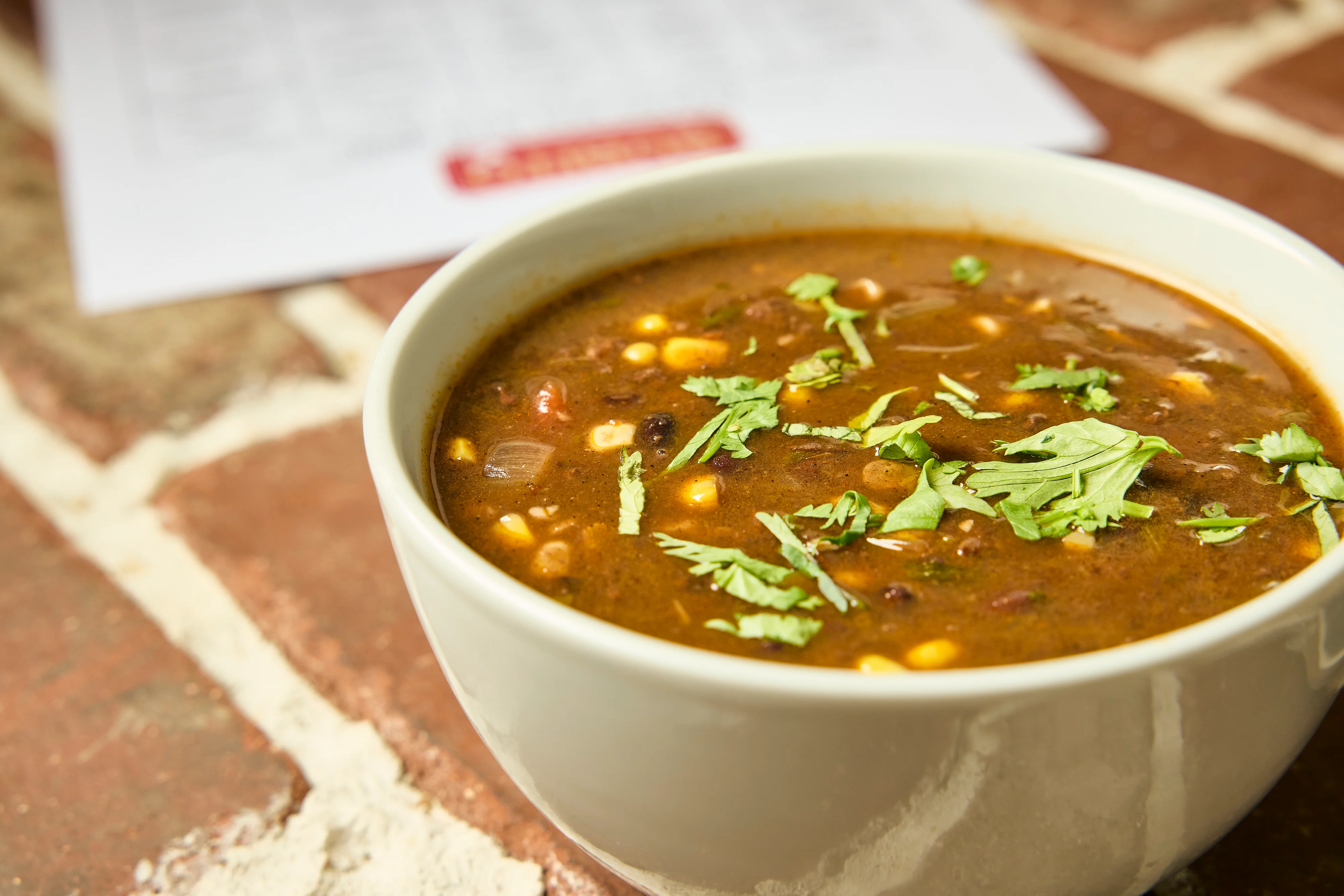 Our hearty vegetable soup is vegan free and gluten free, served daily. Pair it with a warm Garda roll to soak up all of the delicious broth.