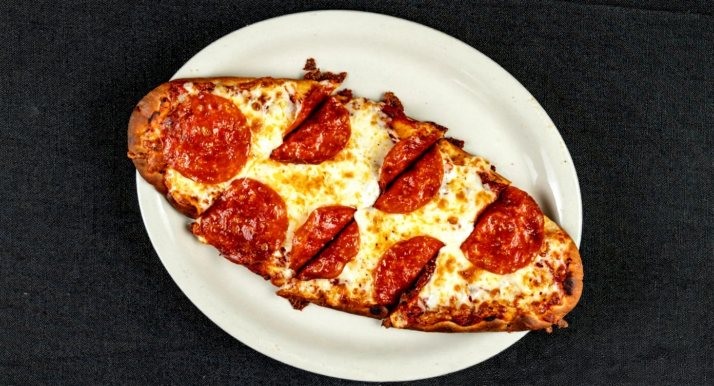 Flatbread pizza topped with fresh ingredients from Hubbs Pizzeria.