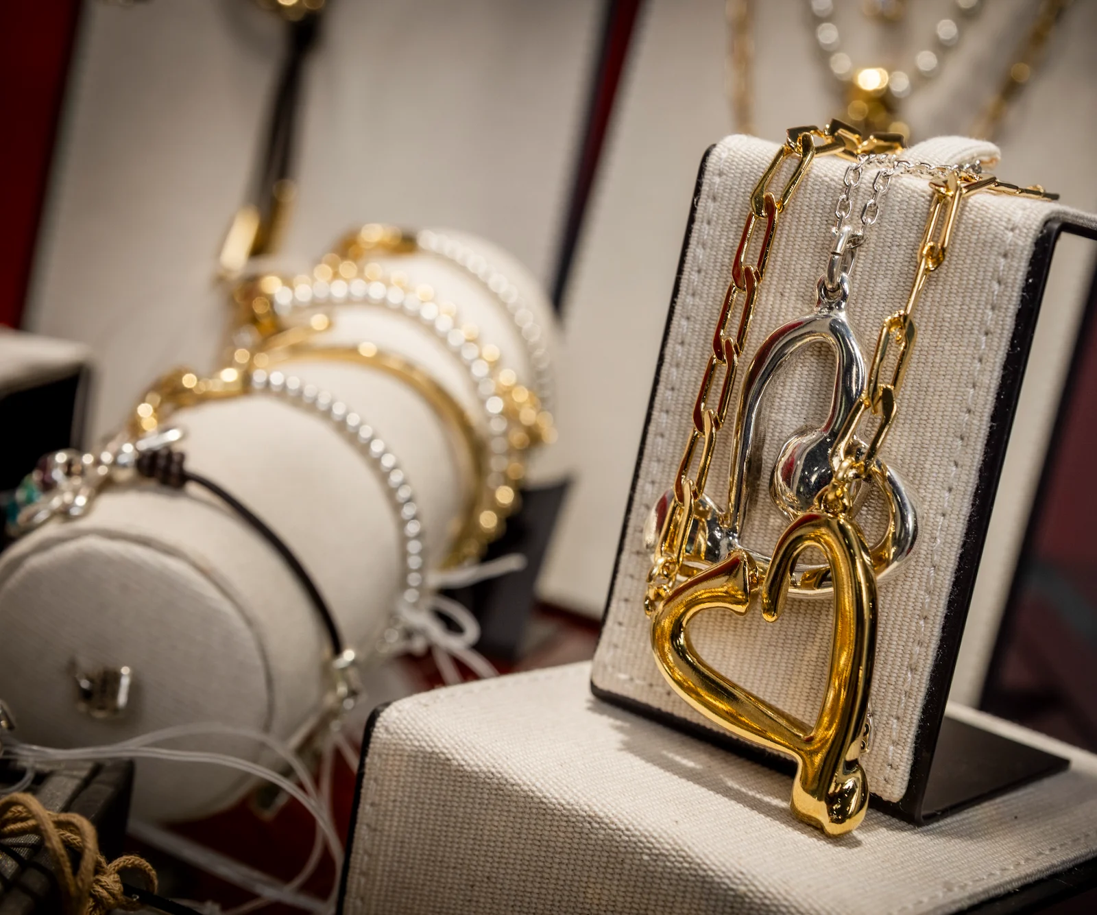 Elegant gold and silver heart-shaped jewelry display