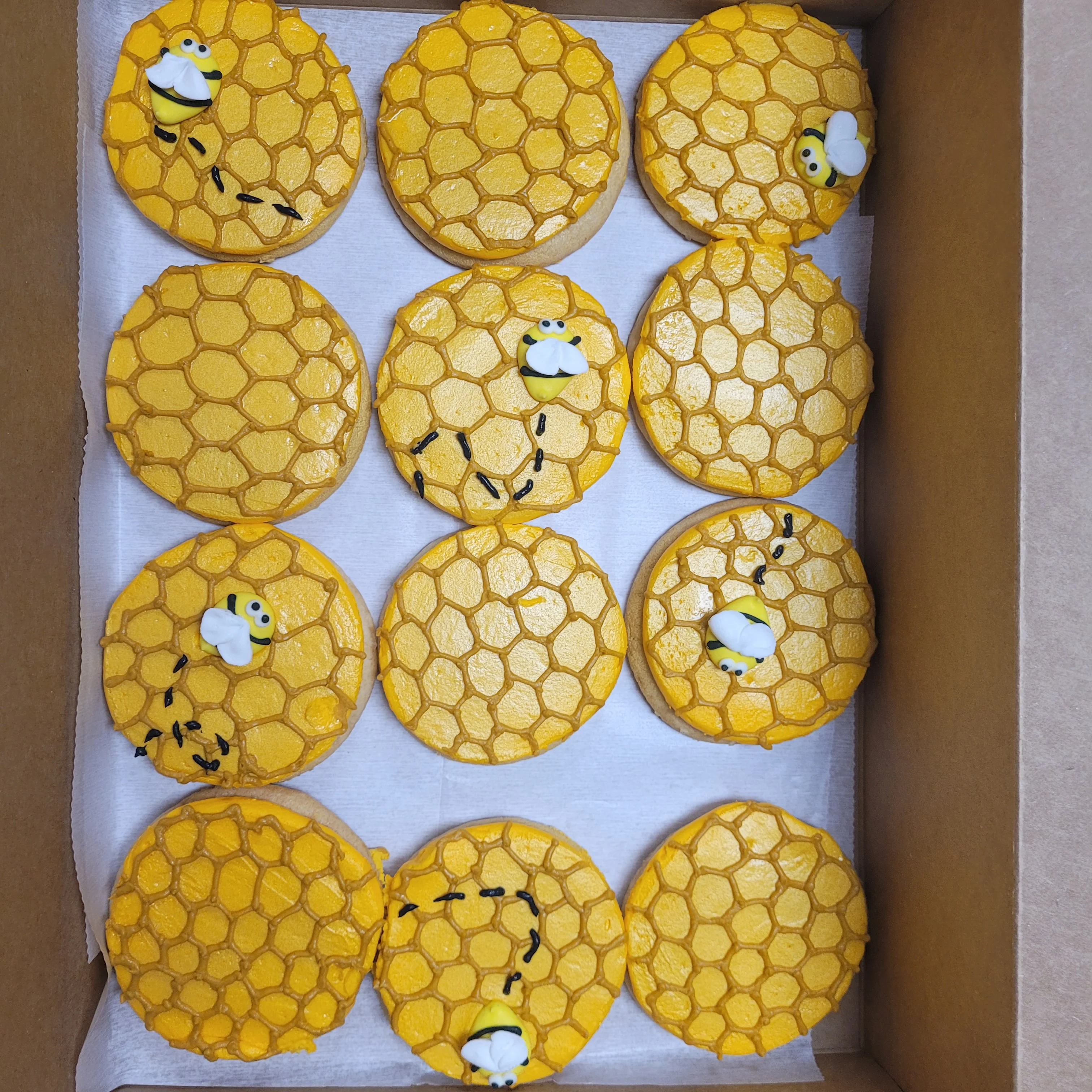 Decorative honeycomb cookies with bee designs