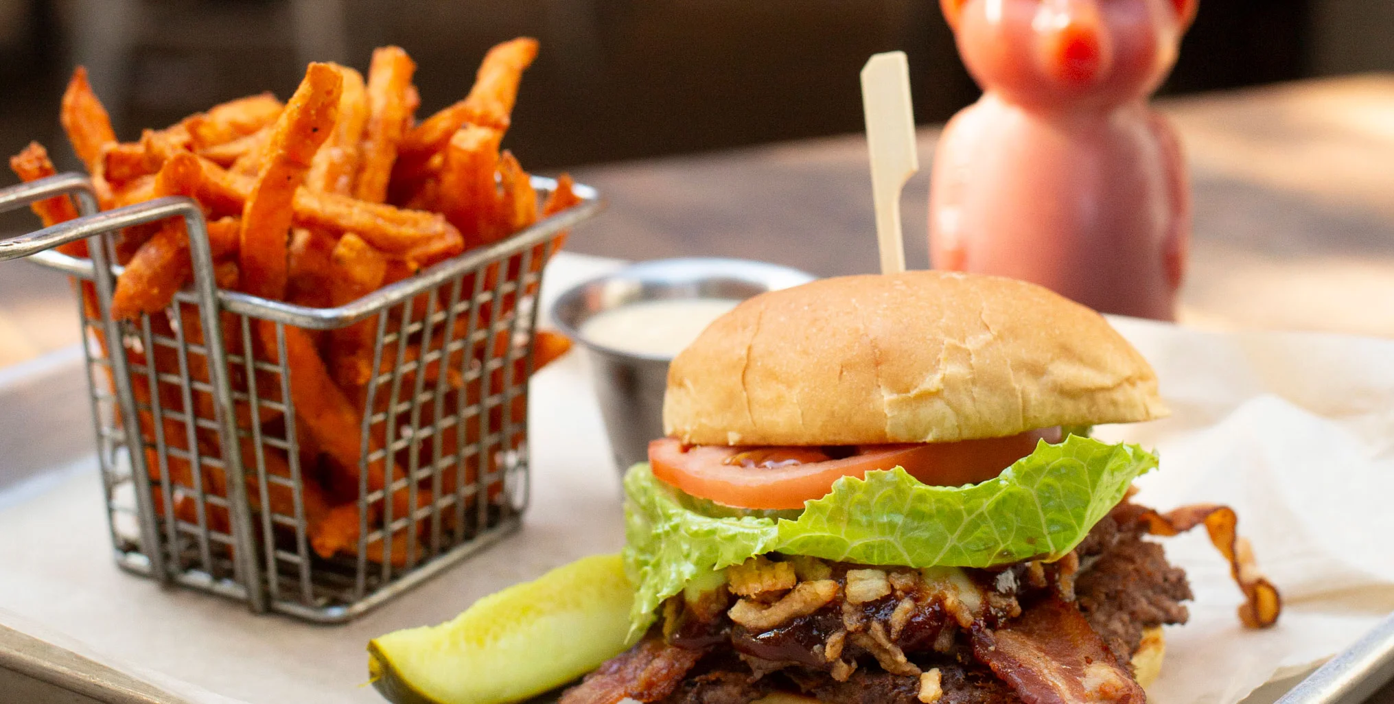 BBQ bacon burger with sweet potato fries