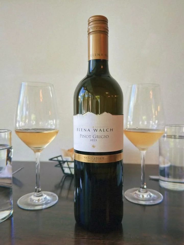 Bottle of Elena Walch Pinot Grigio wine on a dining table