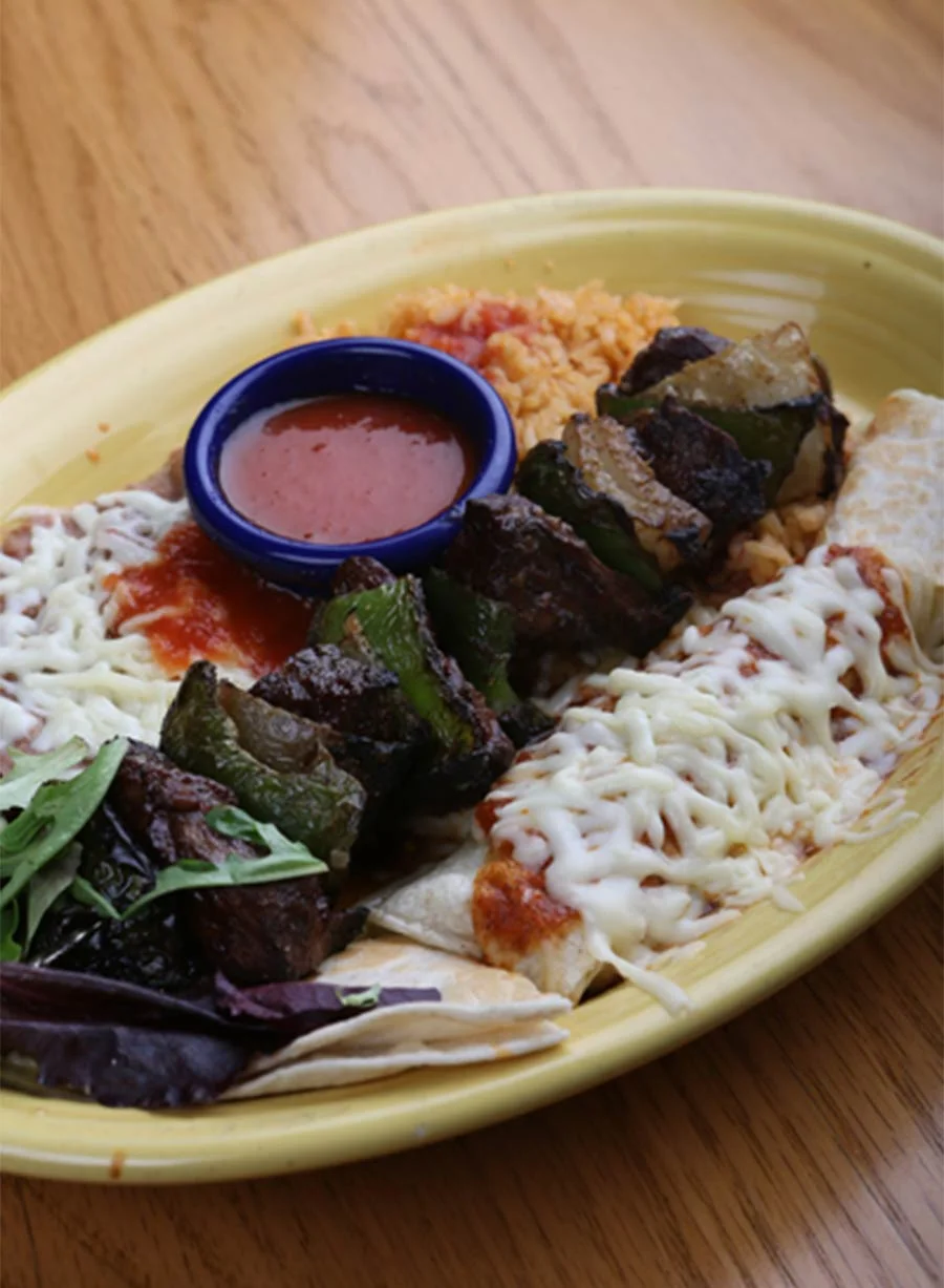 Delicious Mexican fajitas with grilled beef and cheese