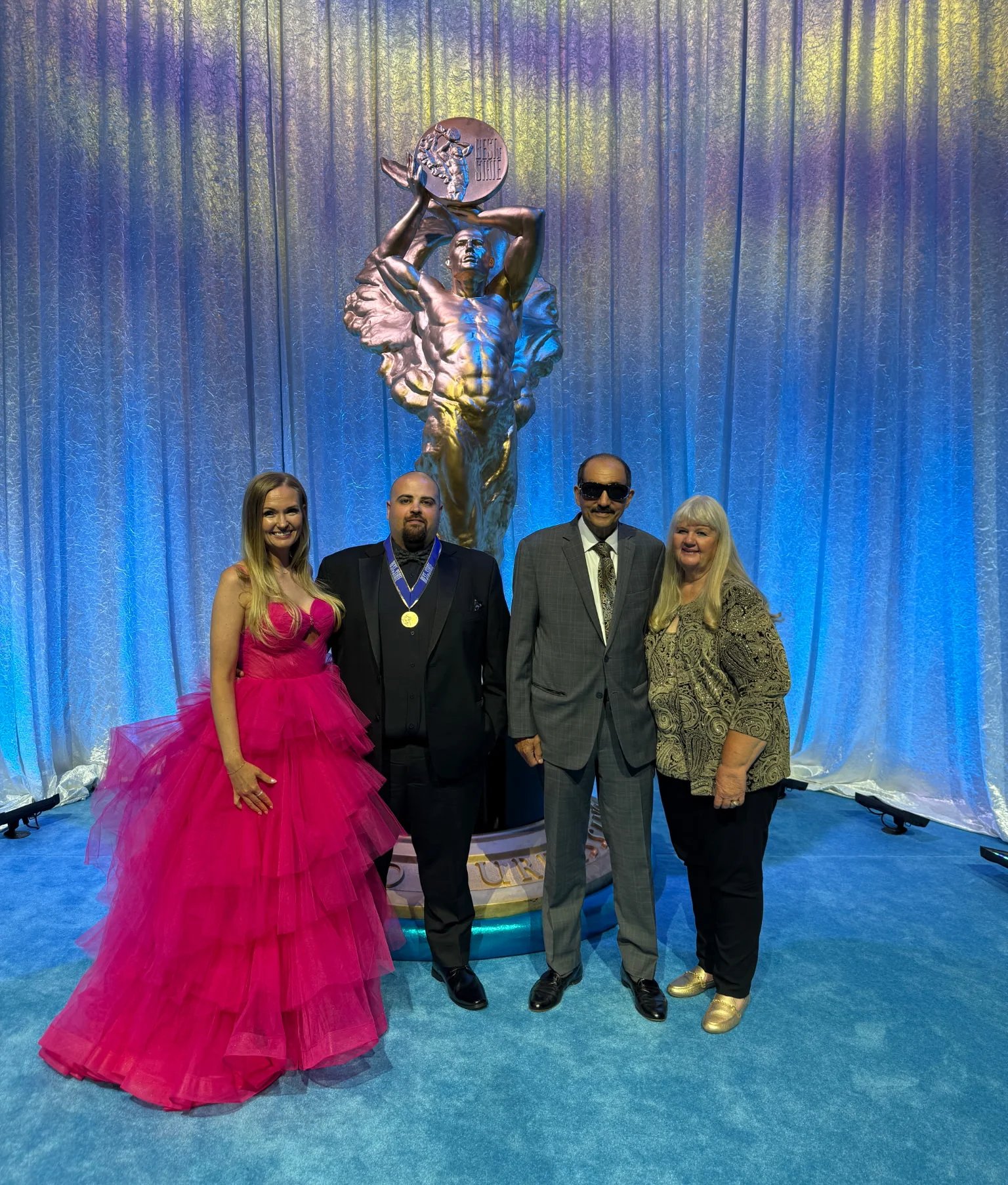 Santorini's Greek Grill team at a Utah awards ceremony celebrating the restaurant's community impact and recognition