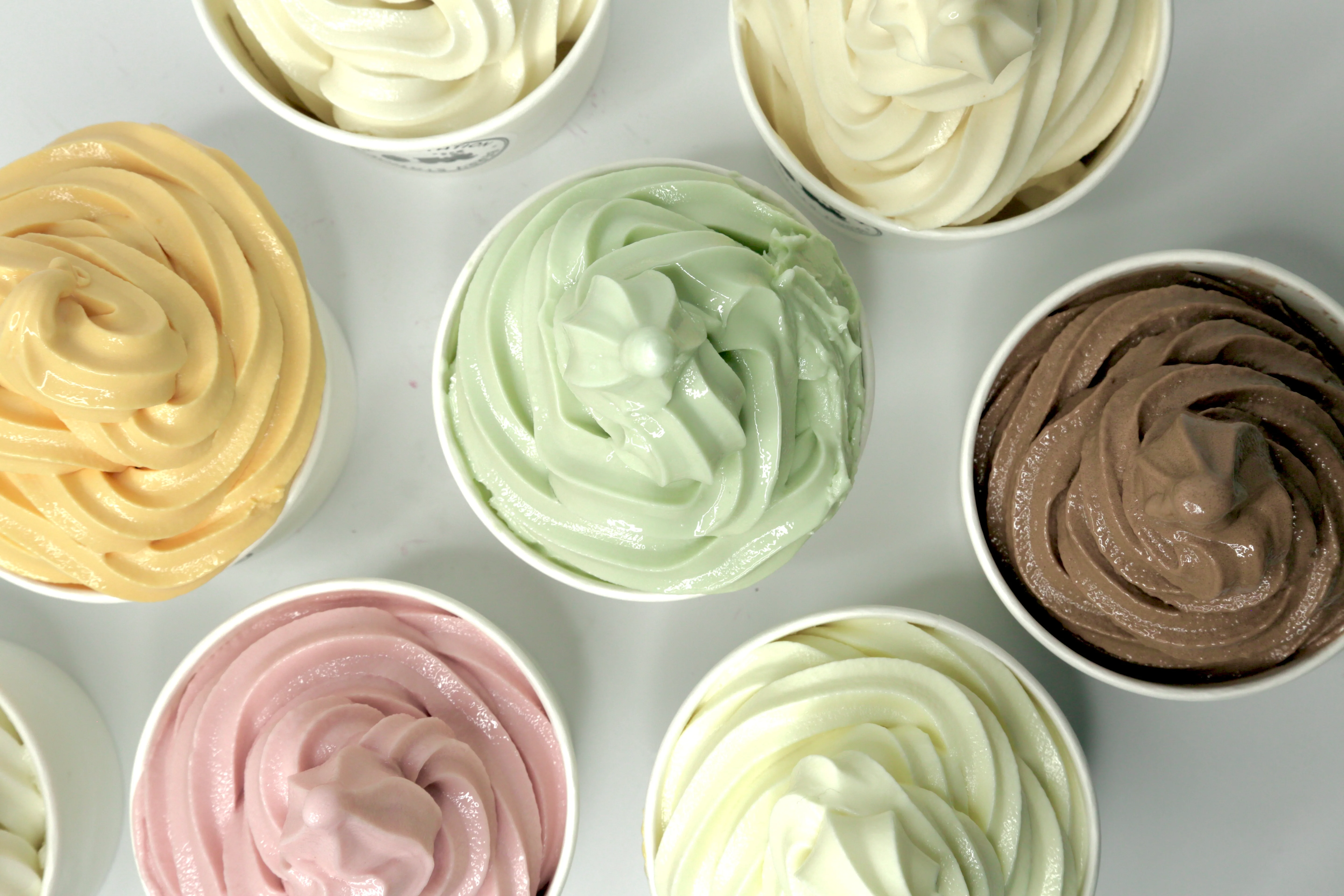 Assorted gelato cups in various flavors