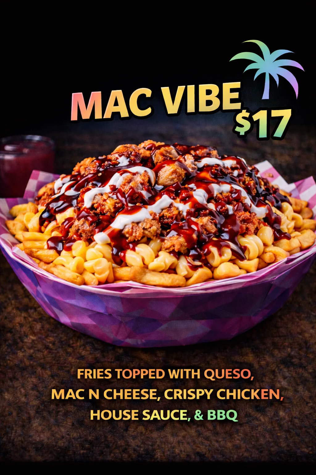 A bowl of fries topped with macaroni and cheese, crispy chicken, BBQ sauce, and house sauce. The dish is colorful and visually appetizing.