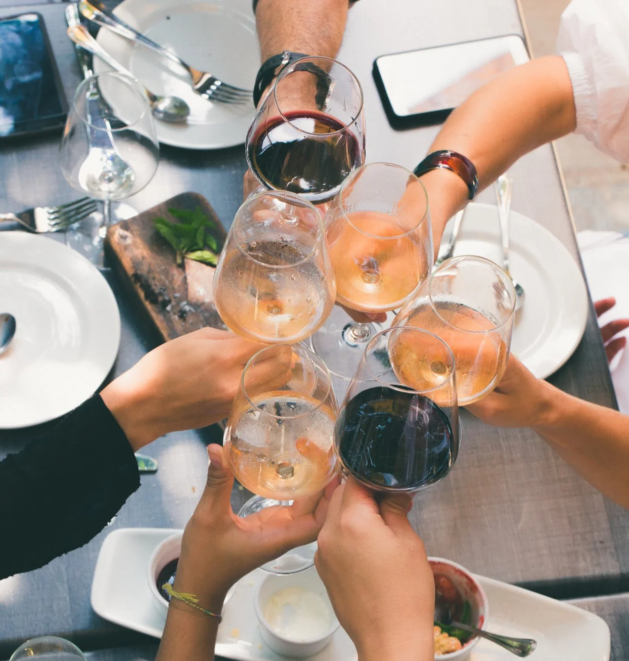 Cheers with wine glasses at a festive gathering