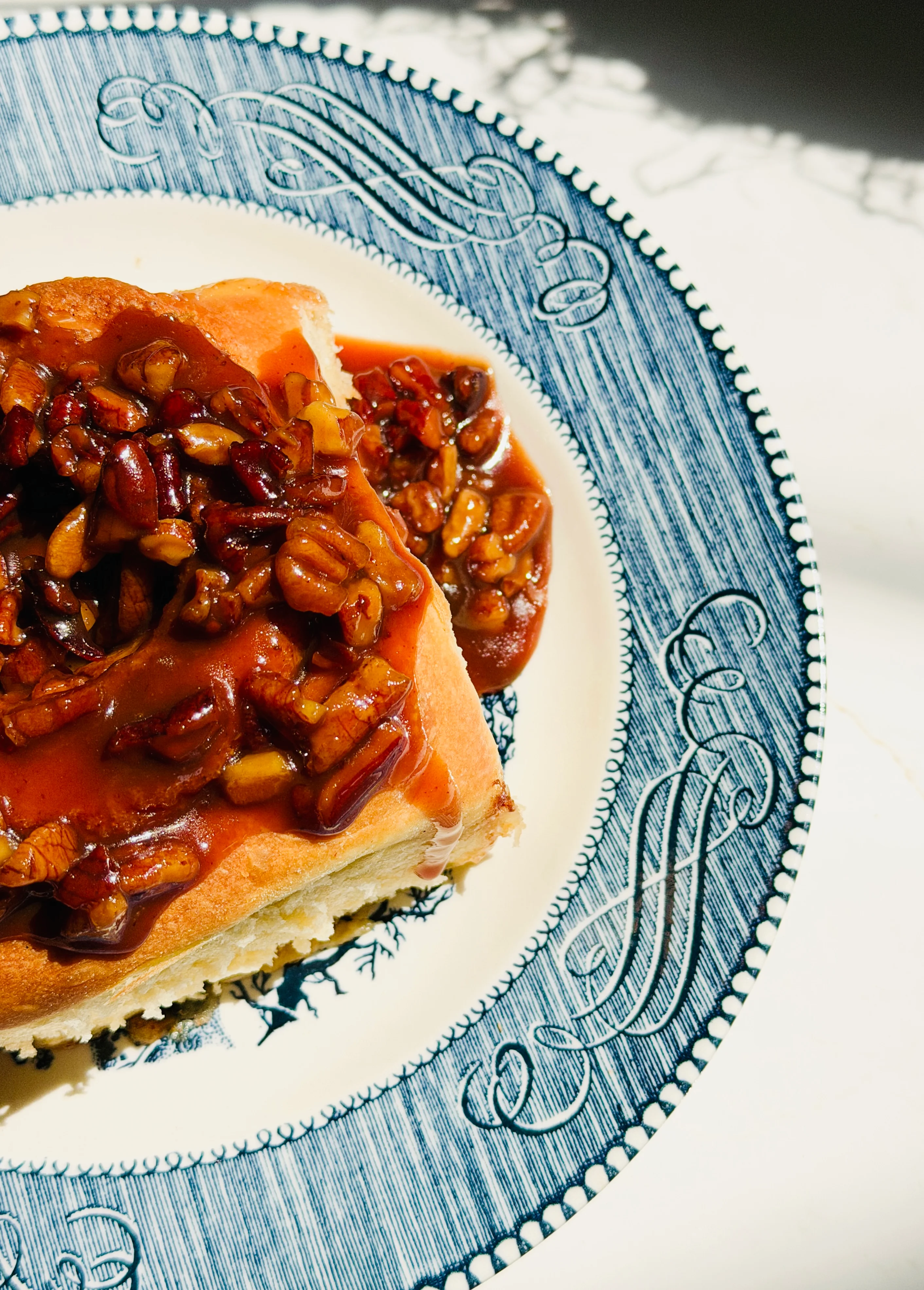 Pecan pie slice on a decorative plate