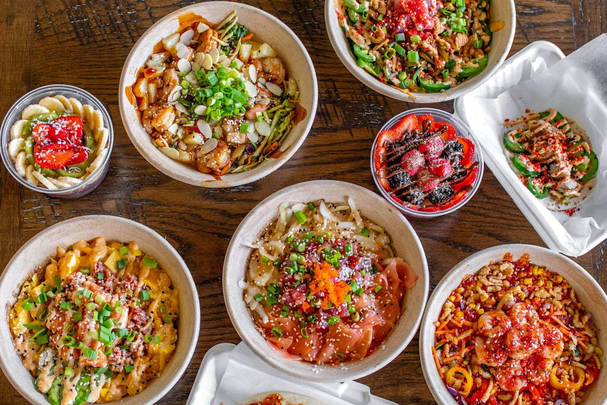 Assorted Asian rice bowls with vibrant toppings