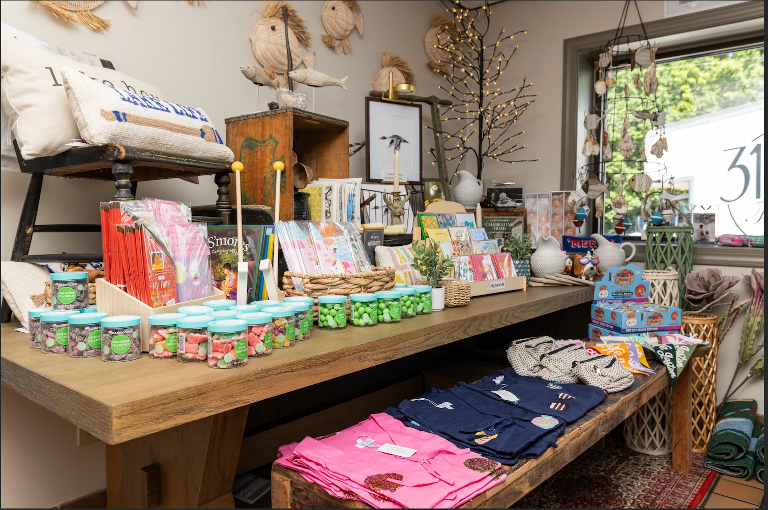 Colorful gift items and decor displayed in a cozy shop setting.