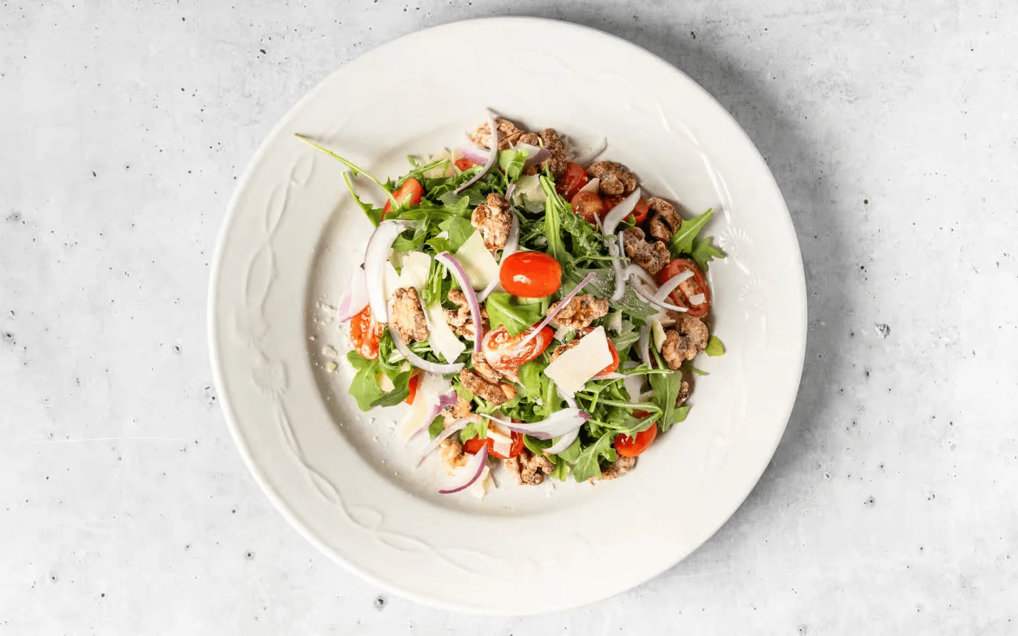 Fresh Italian arugula salad with cherry tomatoes