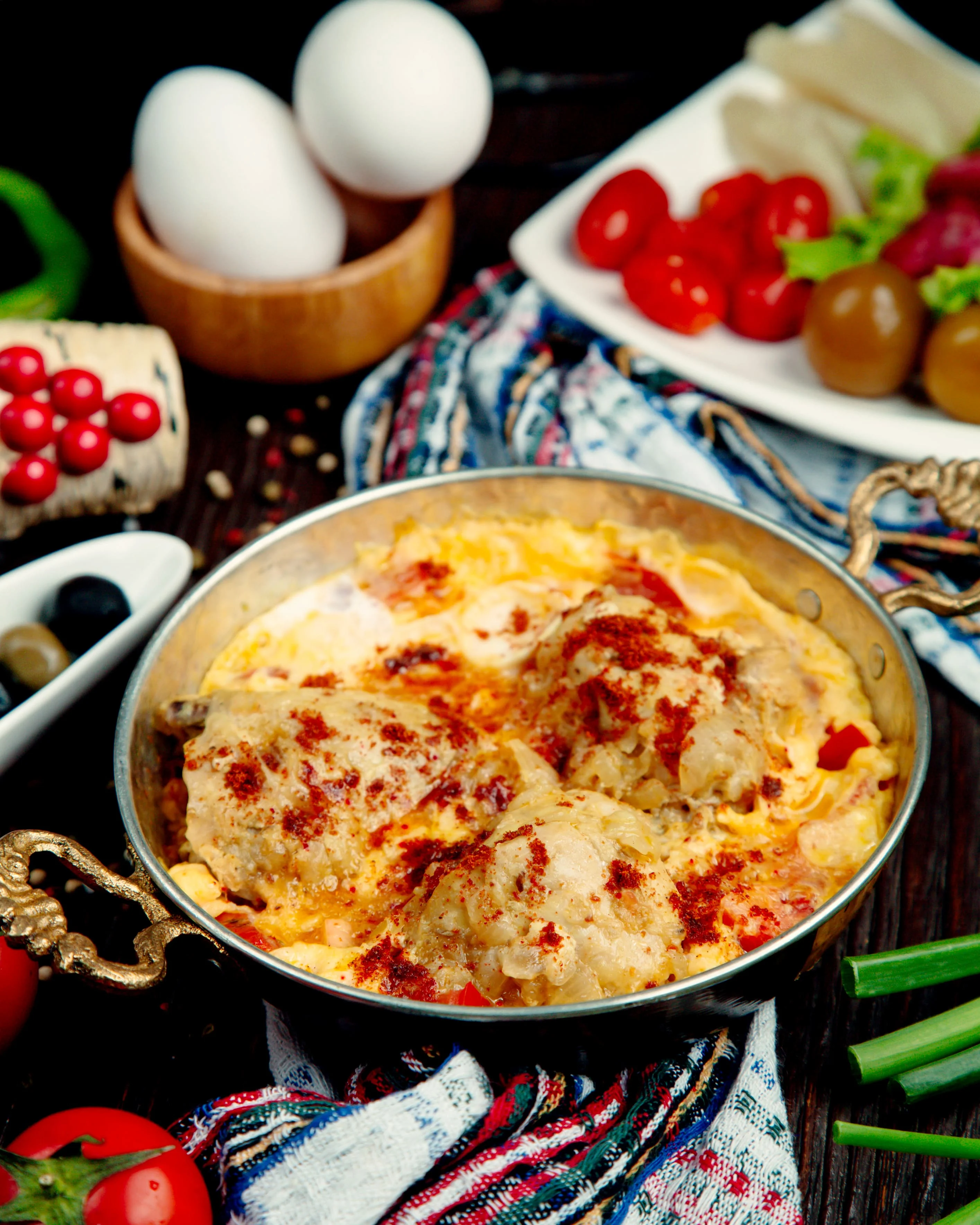 Oven-baked Italian dish topped with melted cheese and tomato sauce.