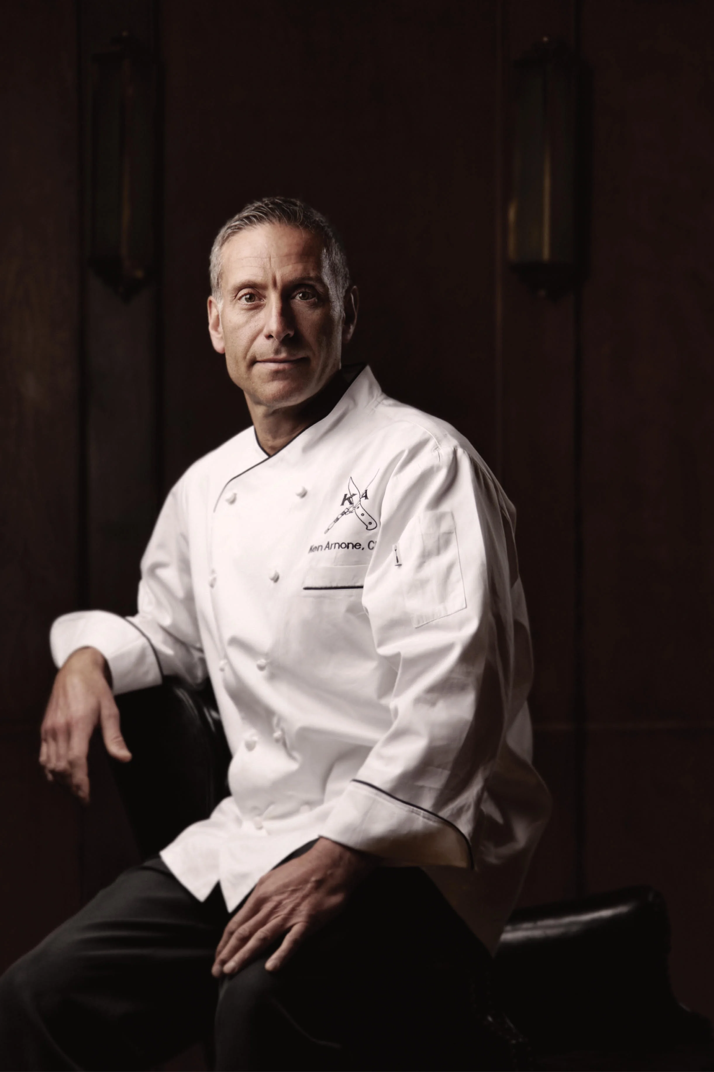 A restaurant chef preparing a dish