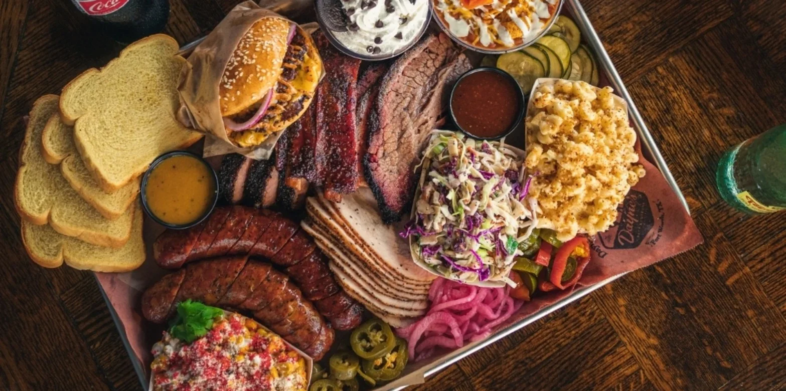 Delicious gourmet burger with fresh toppings on a wooden table