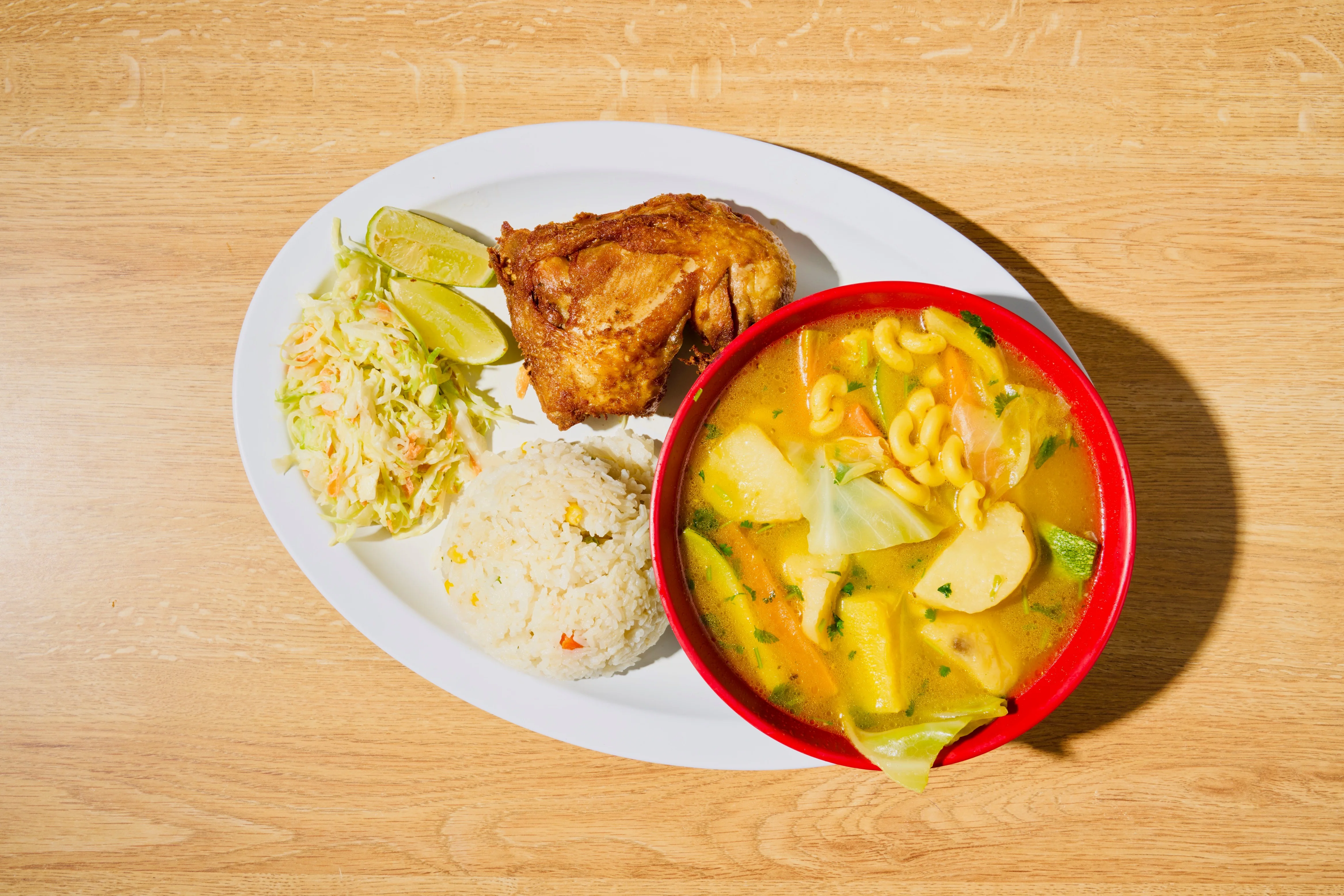 Caribbean chicken soup with rice and coleslaw