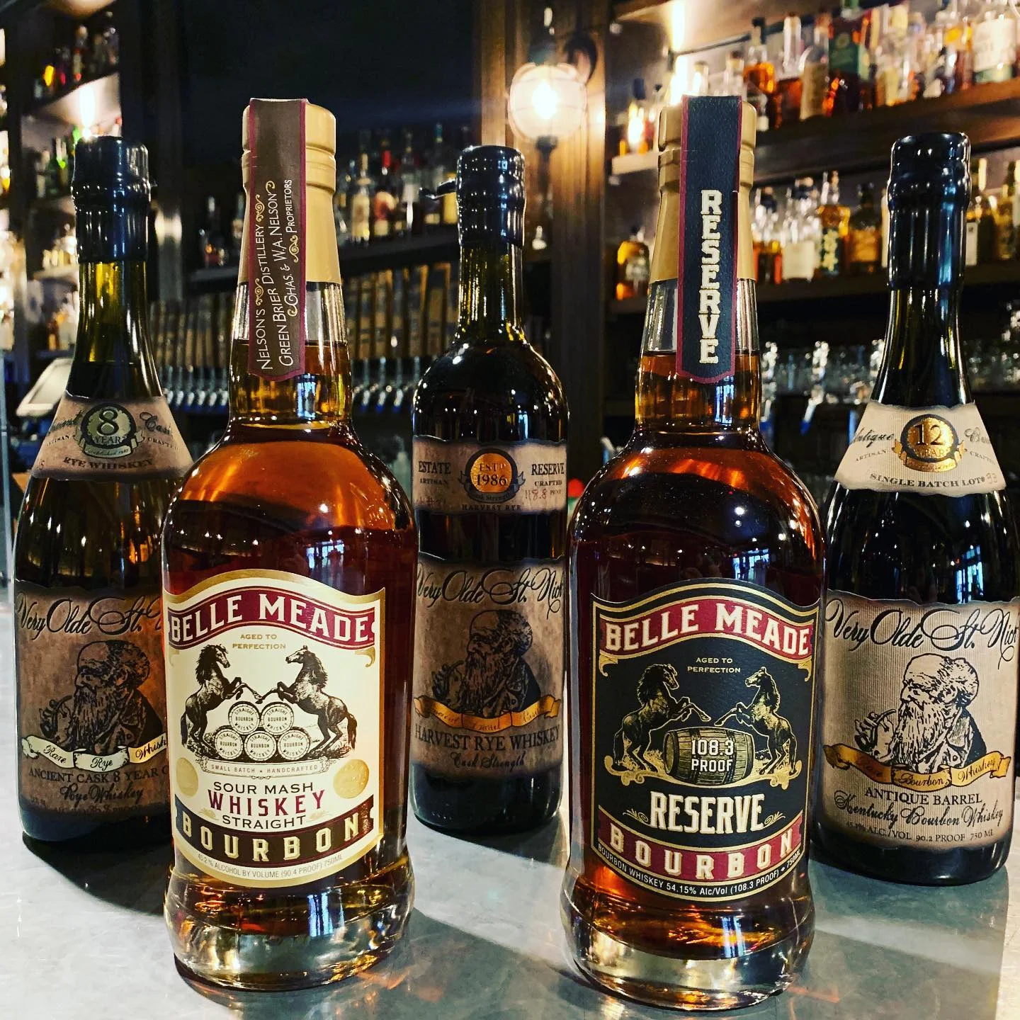 Selection of premium bourbons on a bar counter