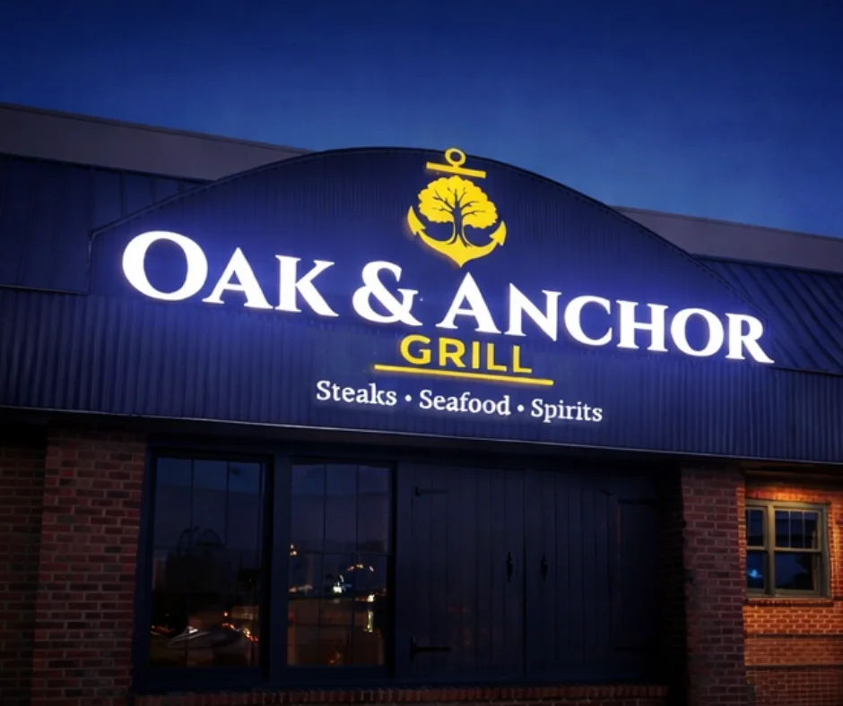 Exterior of Oak & Anchor Grill restaurant at night