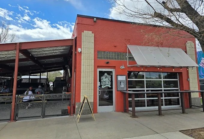 Exterior view of a vibrant restaurant with outdoor seating