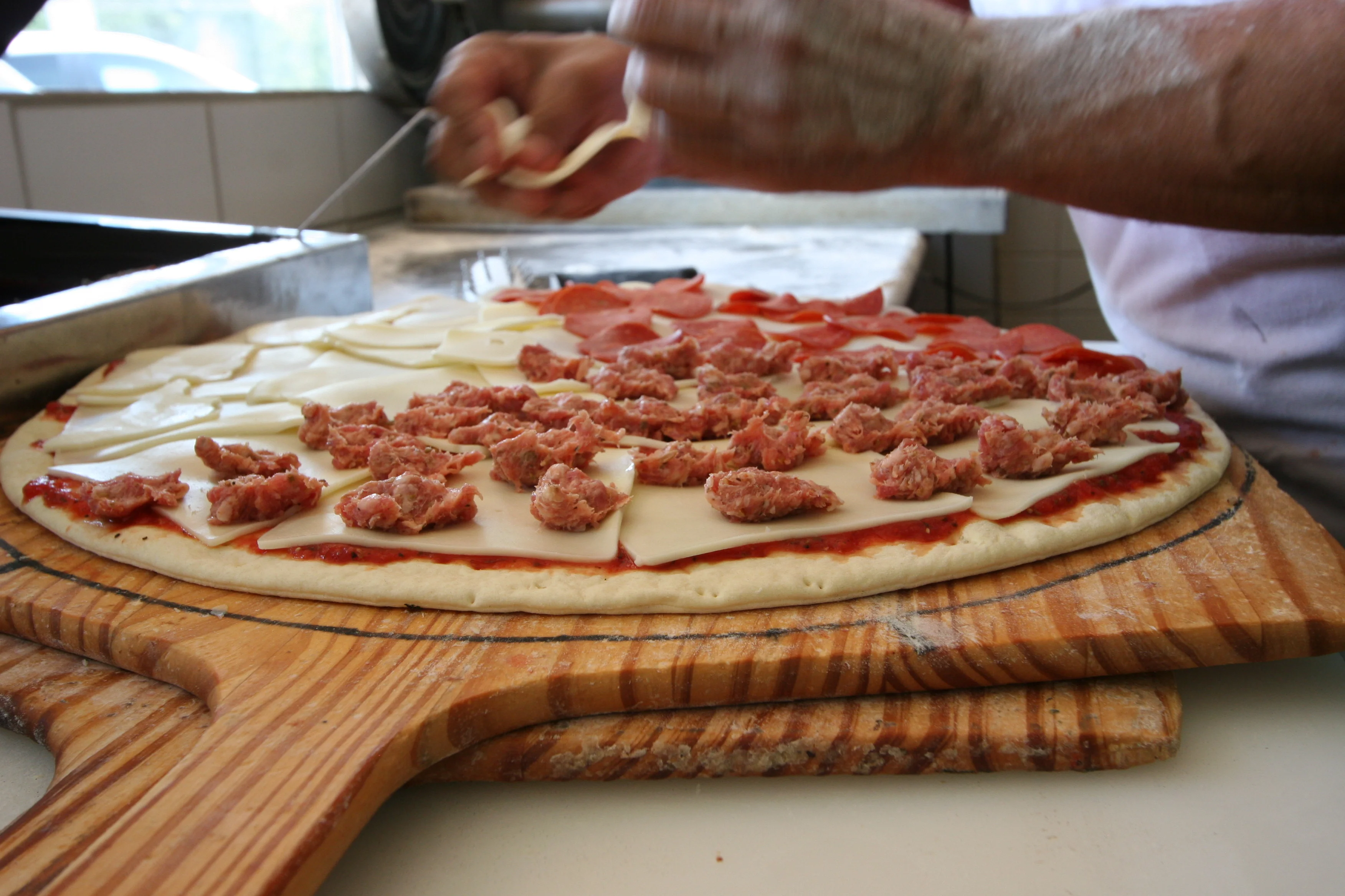 A restaurant chef preparing a dish