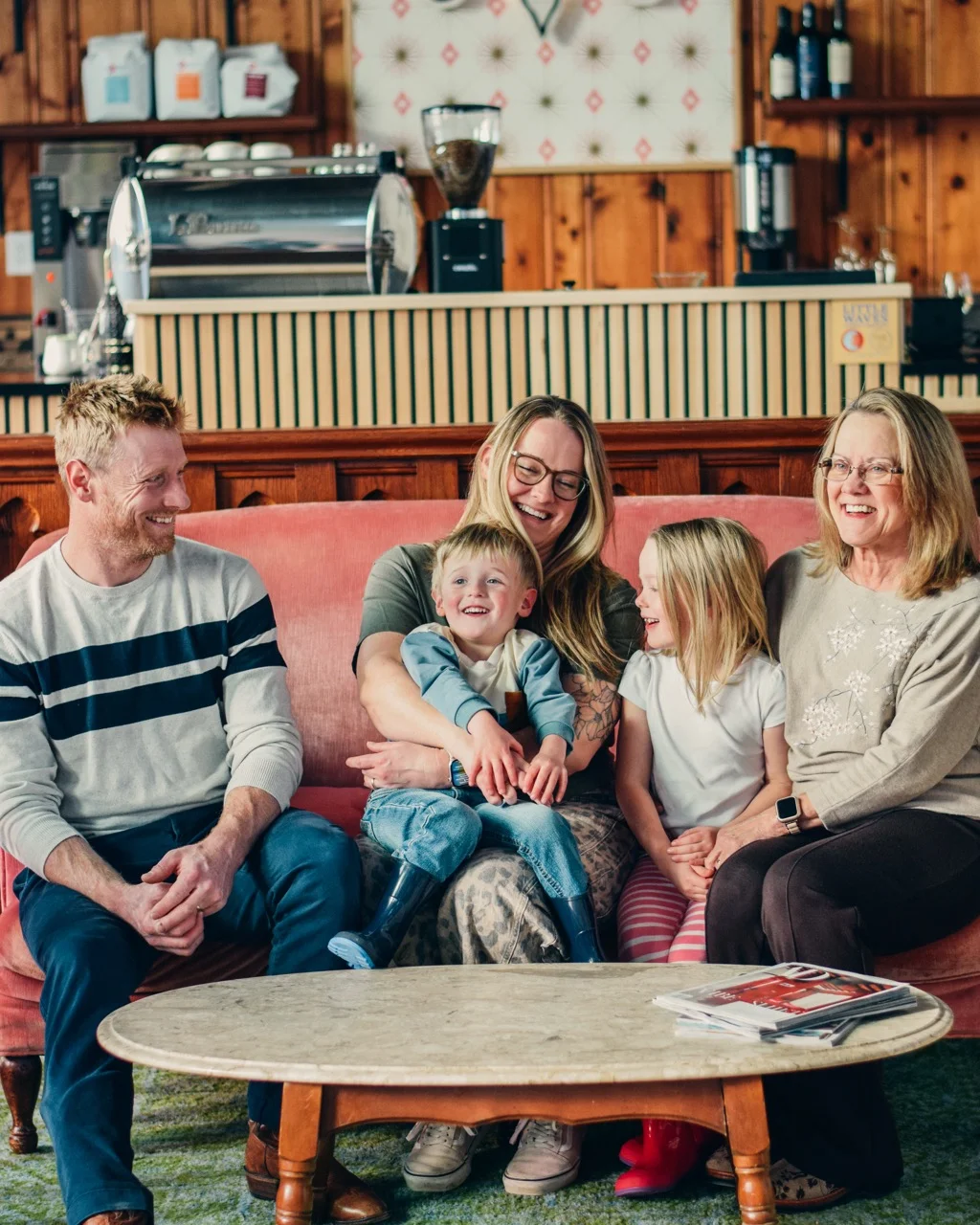 Family enjoying time together in a cozy restaurant setting