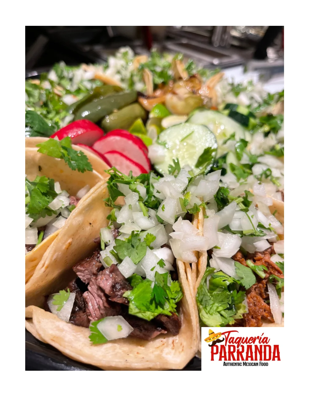 Authentic Mexican street tacos with cilantro and onions