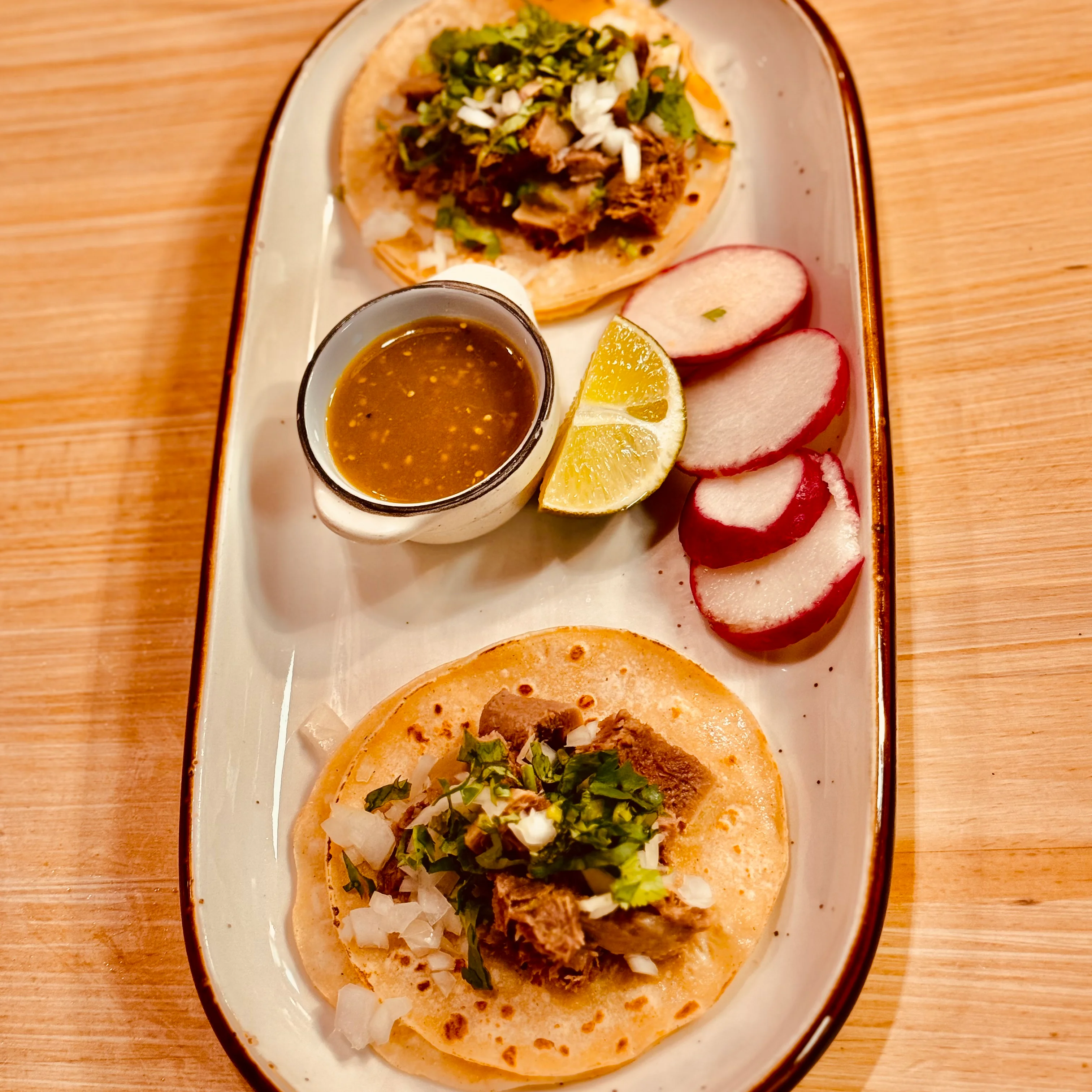 Authentic Mexican tacos with slow-cooked meat and fresh toppings