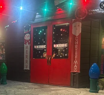 Festive restaurant entrance decorated for Christmas