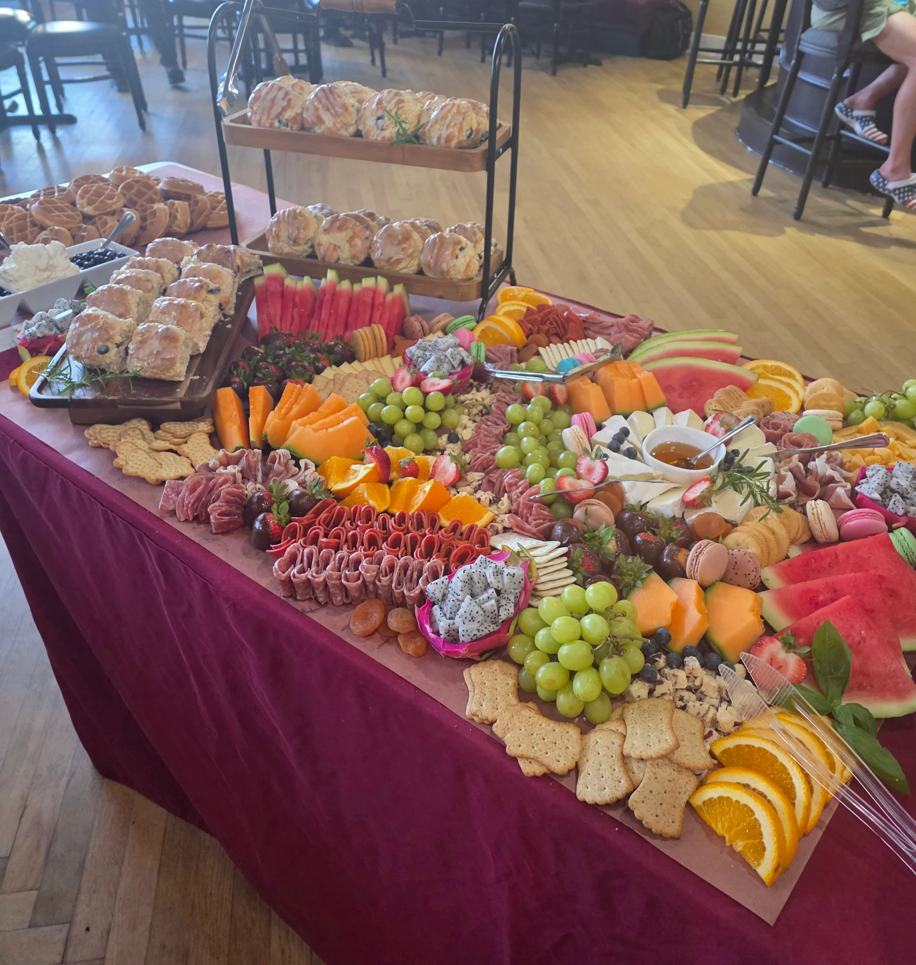 Elegant buffet setup with chafing dishes in a spacious dining area