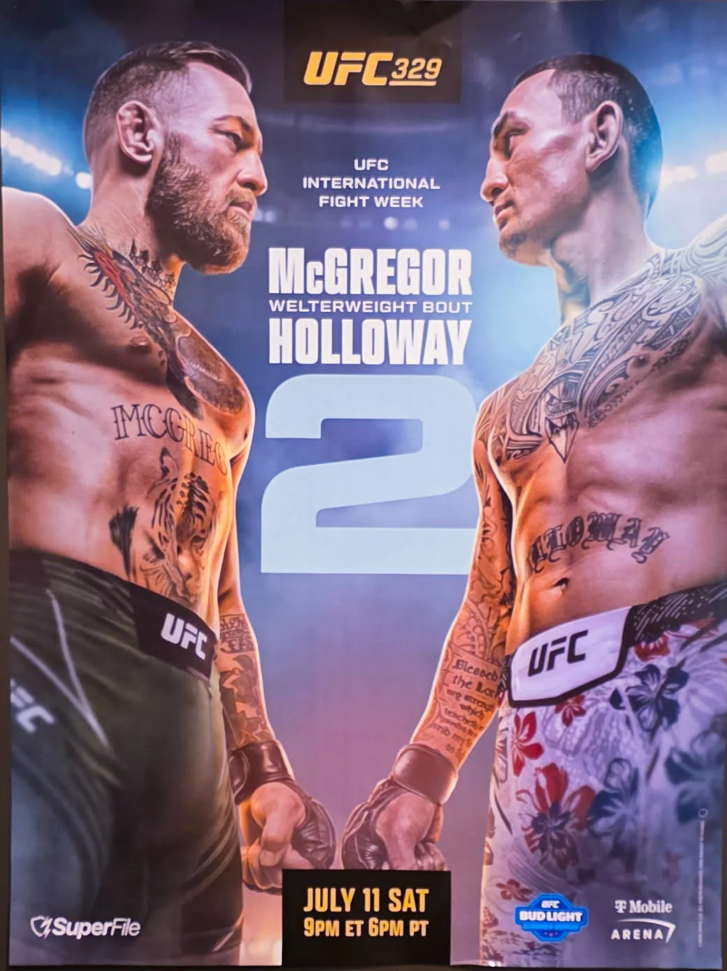 UFC 329 poster featuring McGregor vs Holloway fight announcement