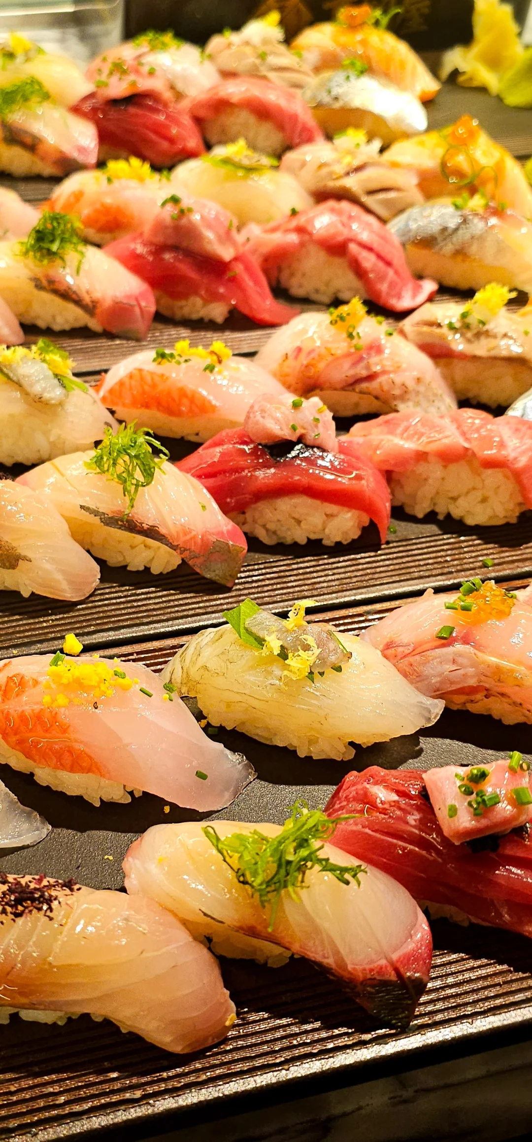 Assorted sushi platter featuring various types of nigiri