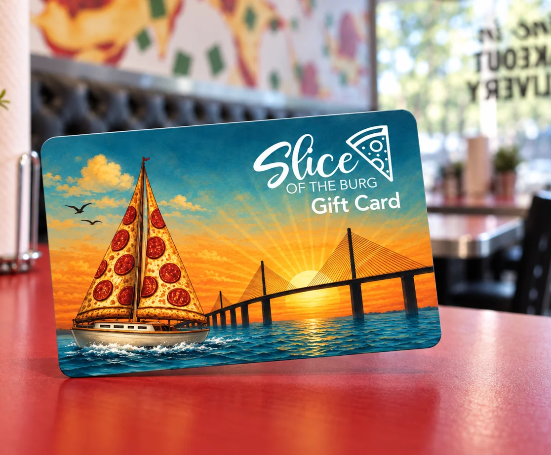 Gift card featuring a pizza sailboat at sunset inside of Slice of the Burg