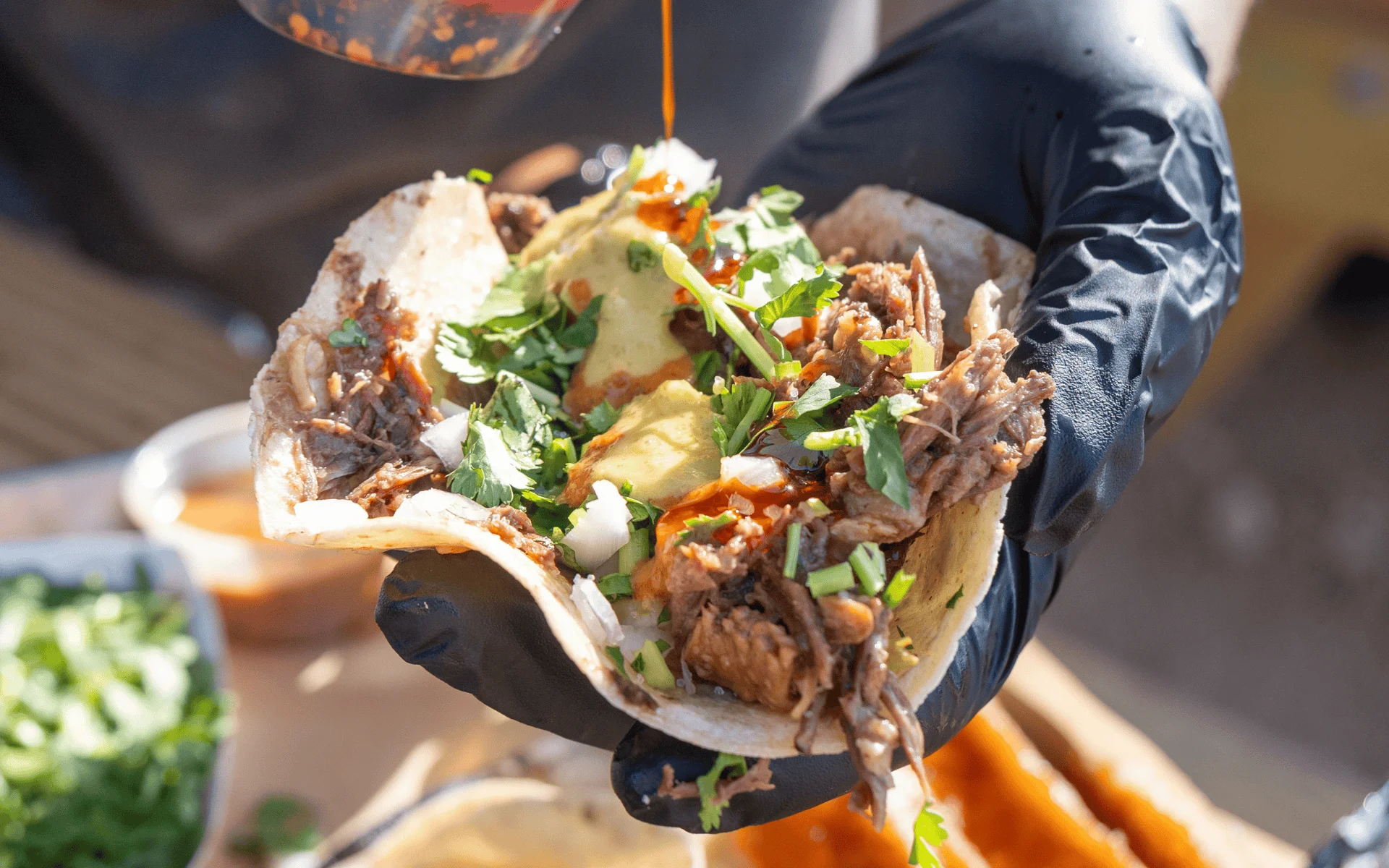 Authentic Mexican taco filled with slow-cooked beef and fresh toppings