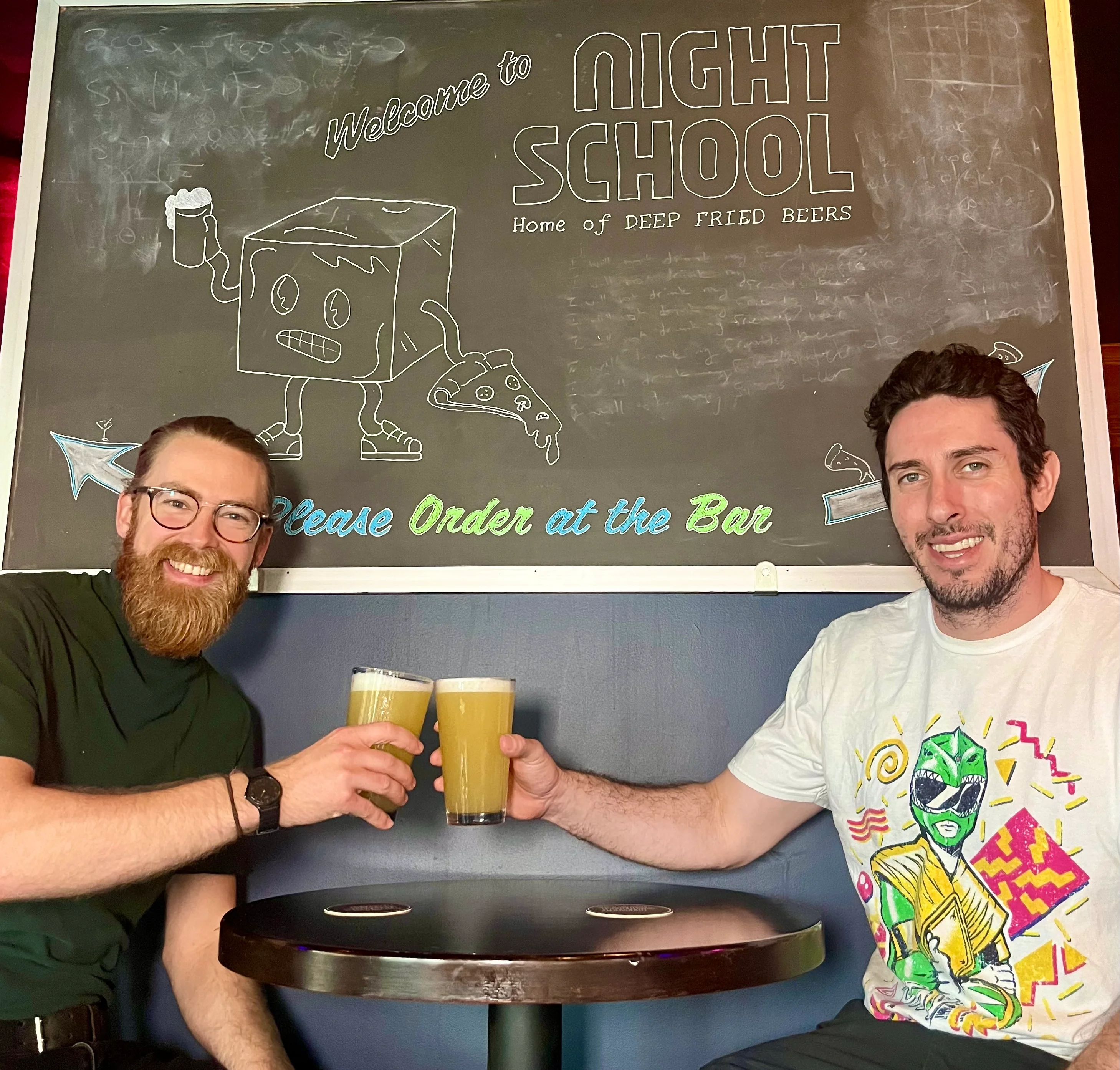 Nate & Johnny cheers with Night School's first beer, Homeroom