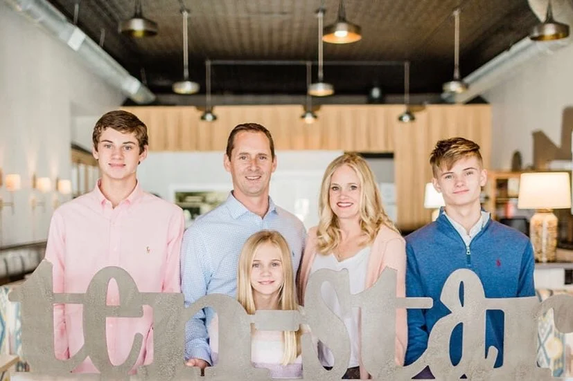 Family portrait in a modern restaurant setting