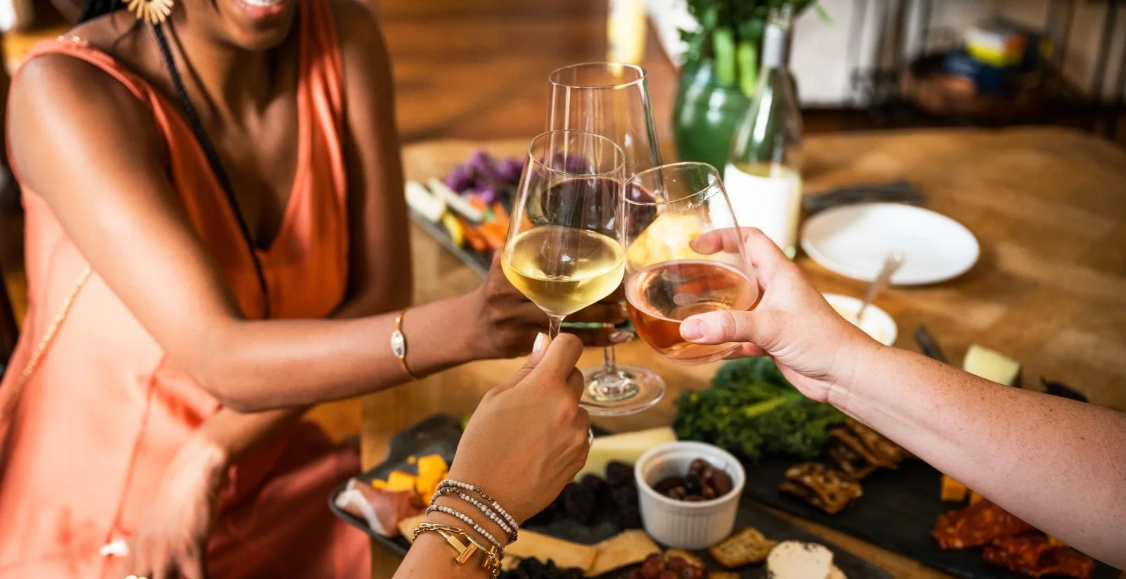 Cheers with wine glasses at a festive gathering