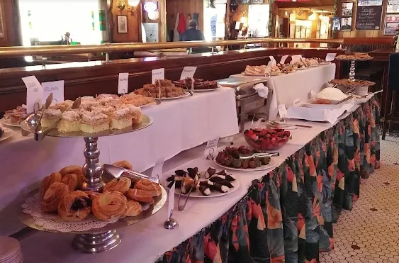 A vibrant buffet display featuring a variety of dishes and colorful food options.
