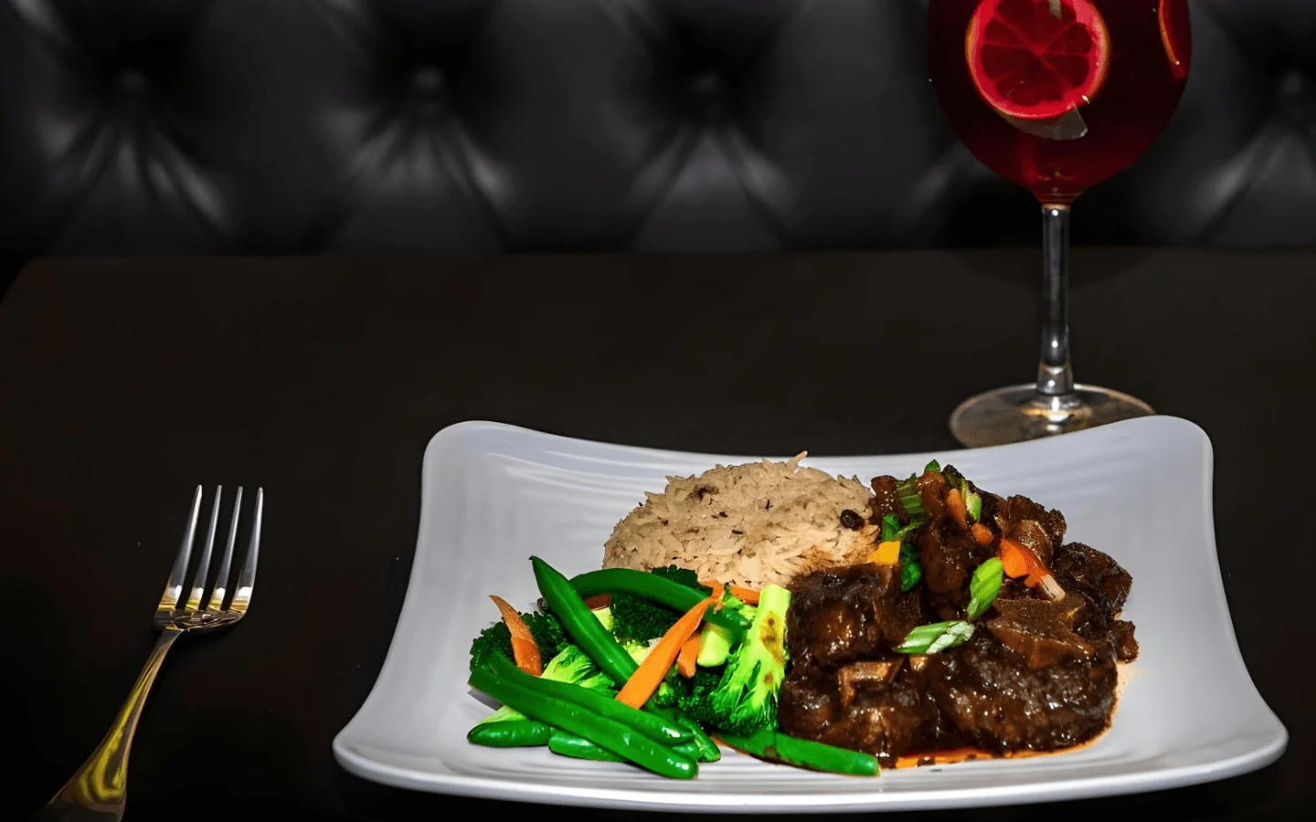 Jamaican oxtail stew with rice and vegetables