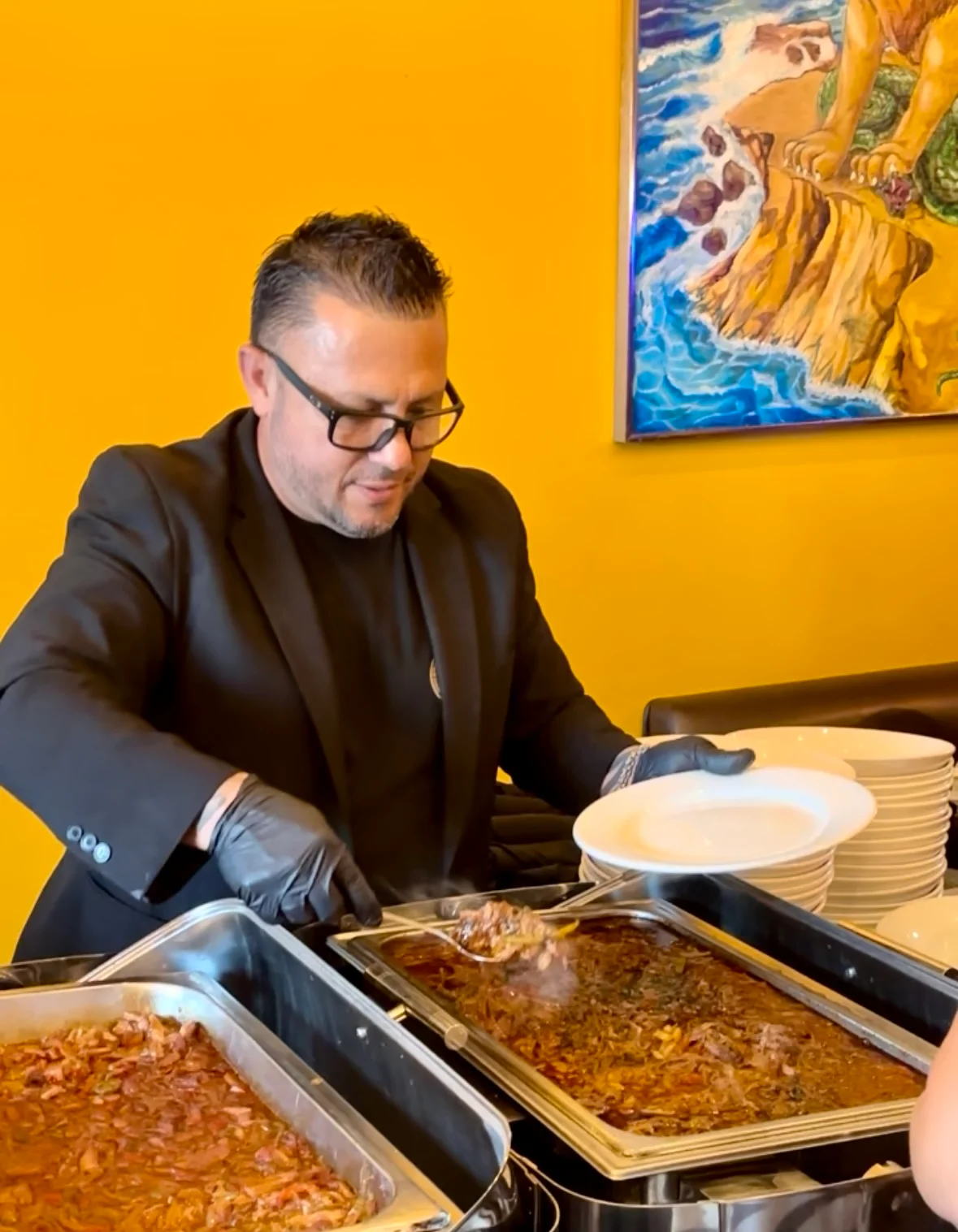 Cuban food being served at catering event