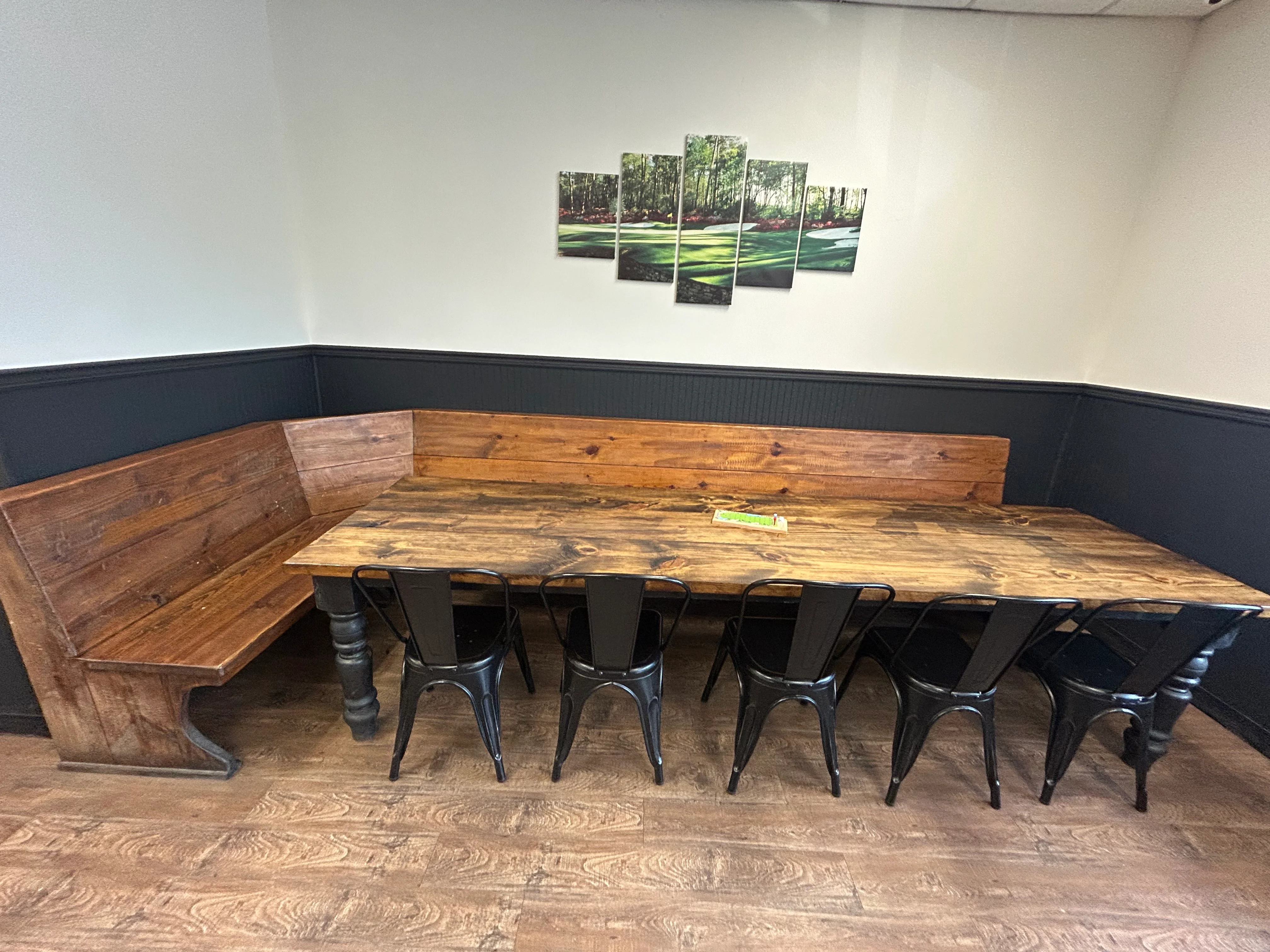 Cozy restaurant dining area with wooden table and benches