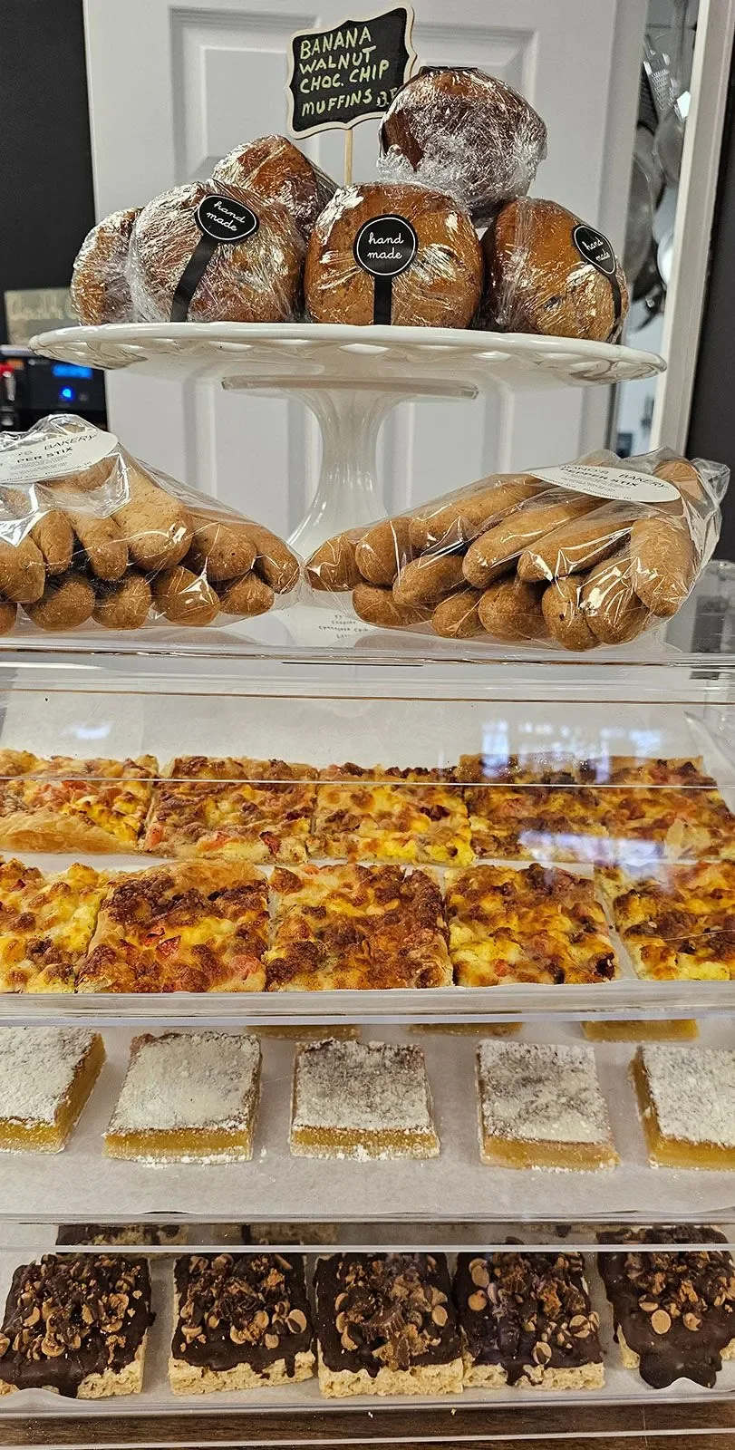 Assorted baked goods including muffins and desserts