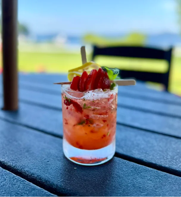Refreshing summer cocktail with strawberries and mint