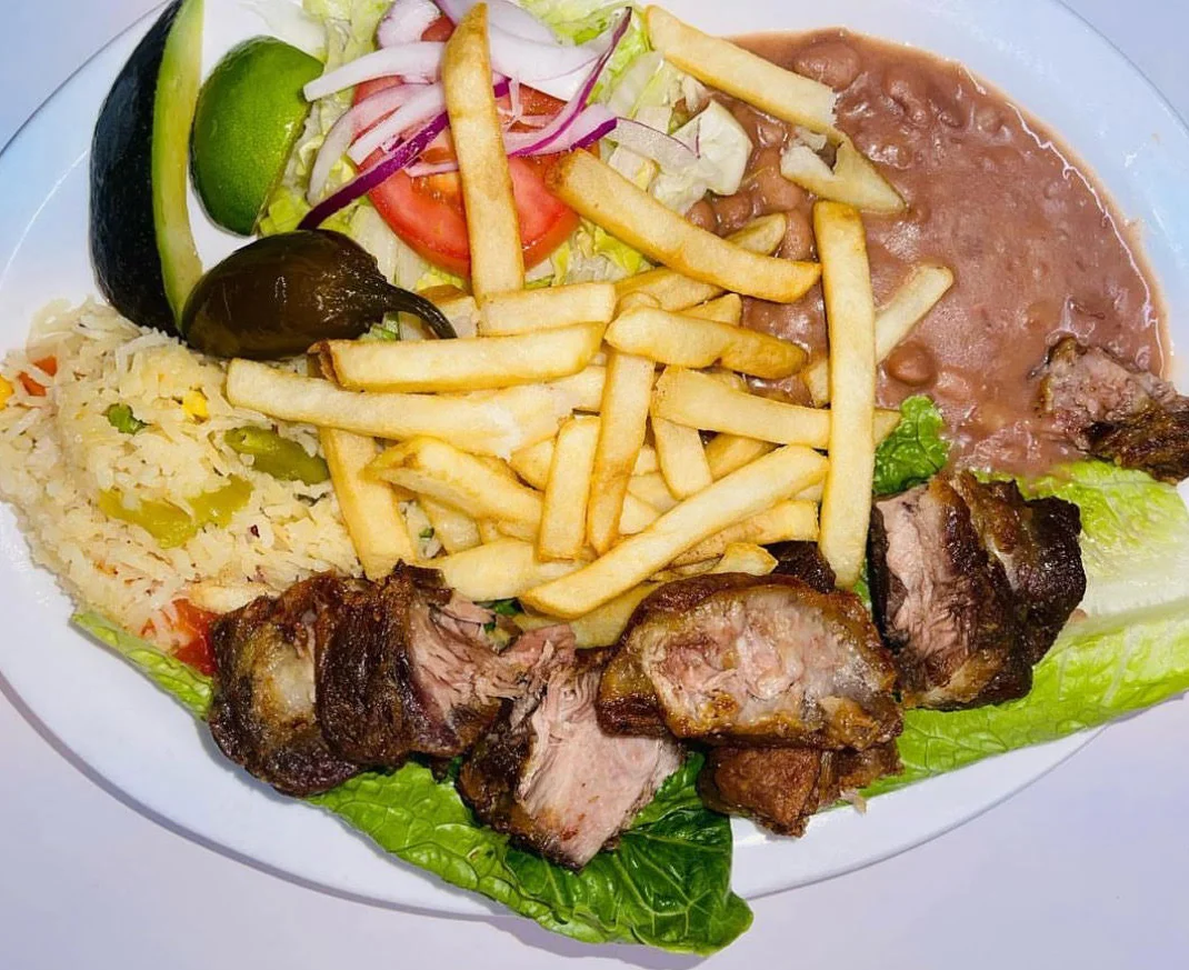 Mexican carne asada platter with rice and beans