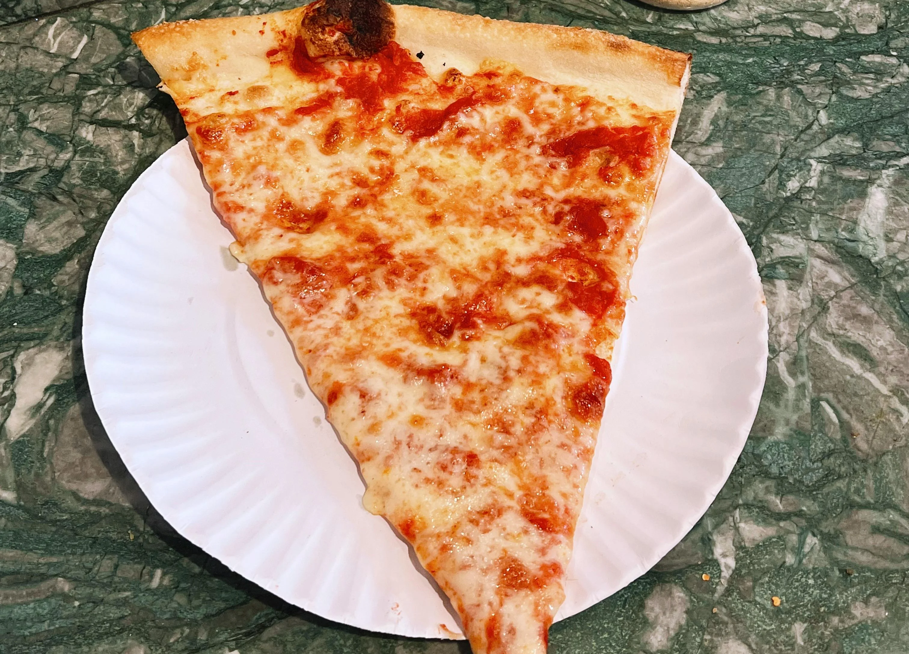 Cheese Slice with a Golden Crust done the New York Style Way.
