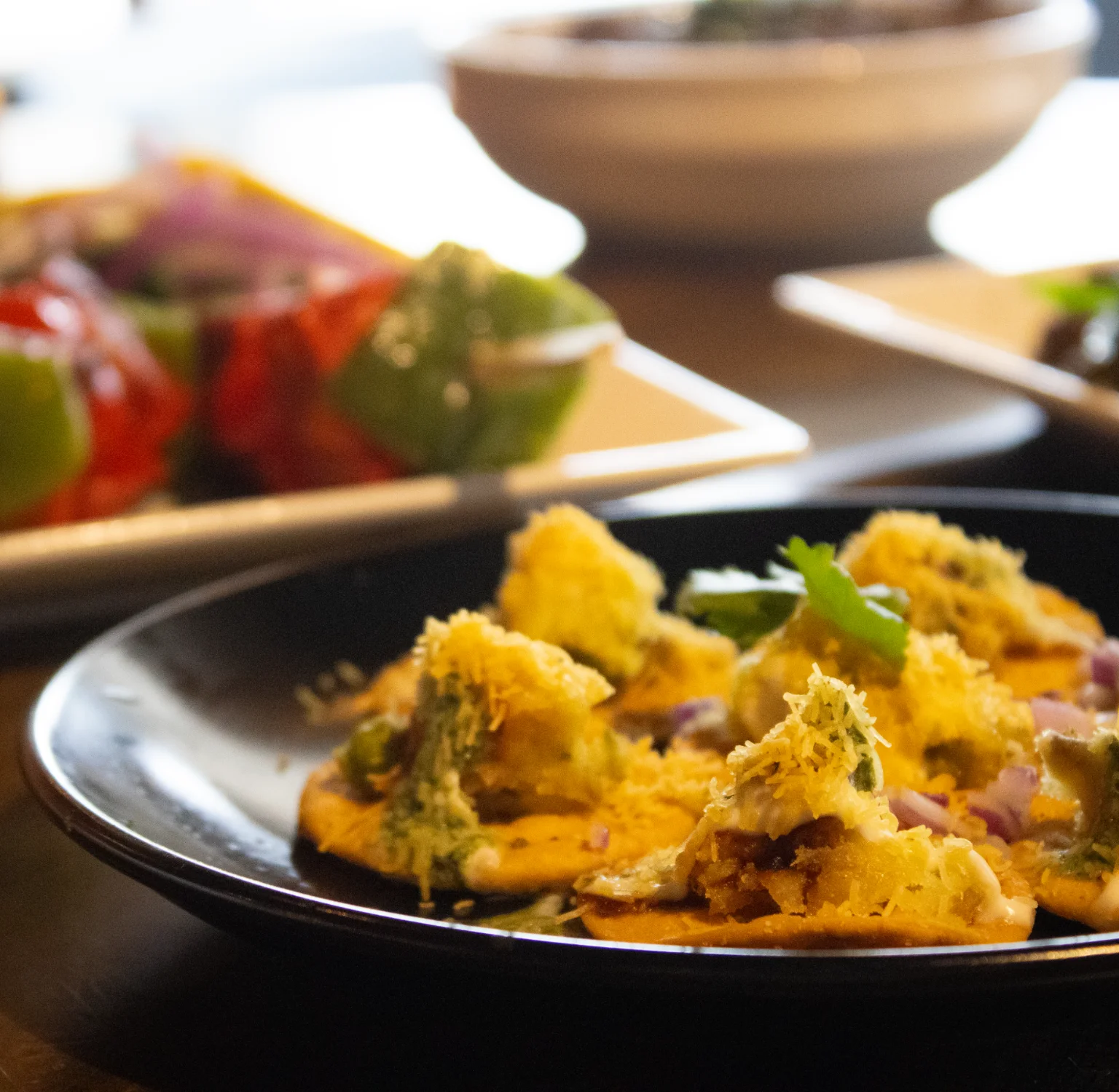 Crispy Indian chaat topped with herbs and spices