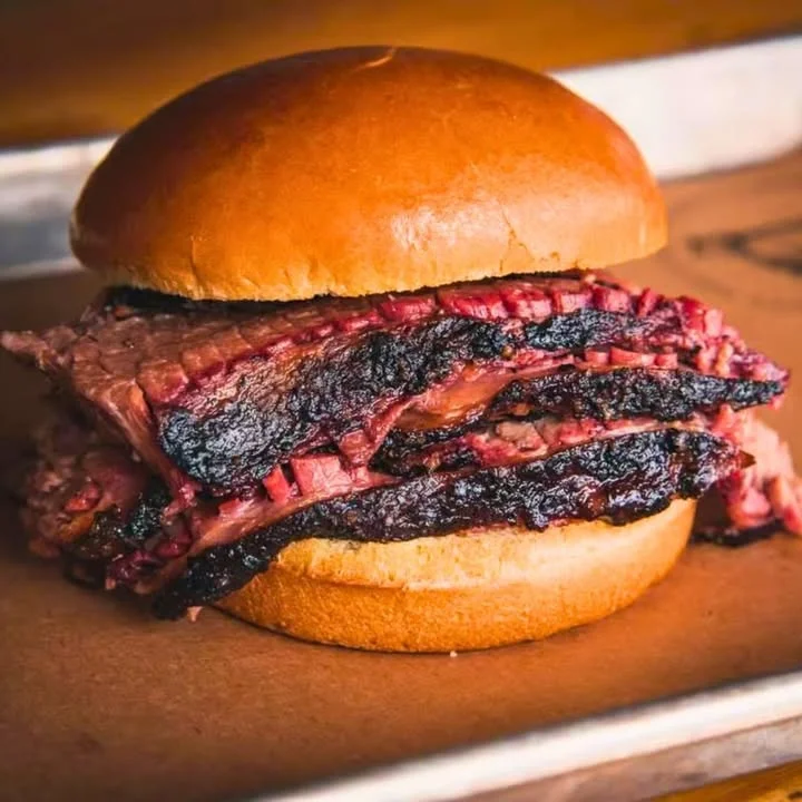 Smoked brisket sandwich on a soft bun
