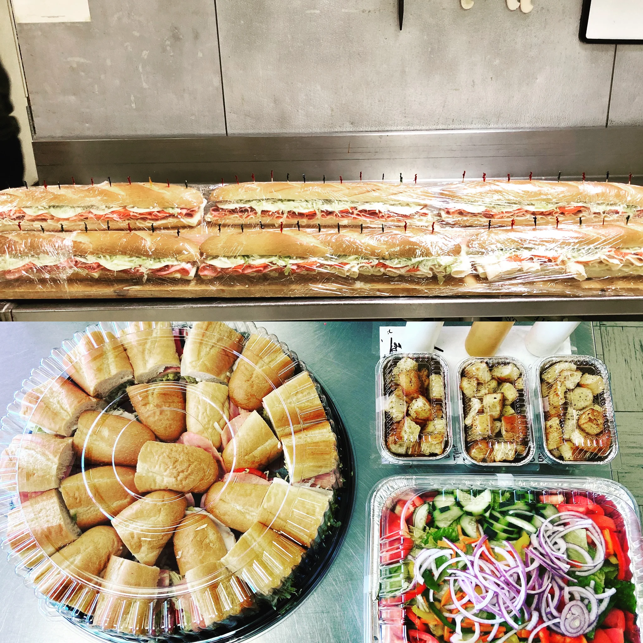 Assorted sandwich platter with fresh vegetables and sides